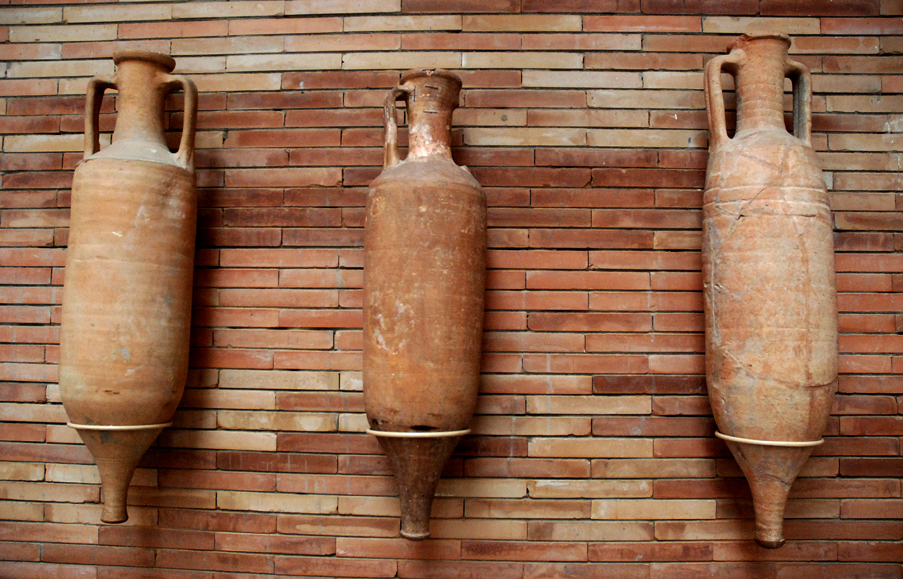 Three Ancient Roman amphoras.