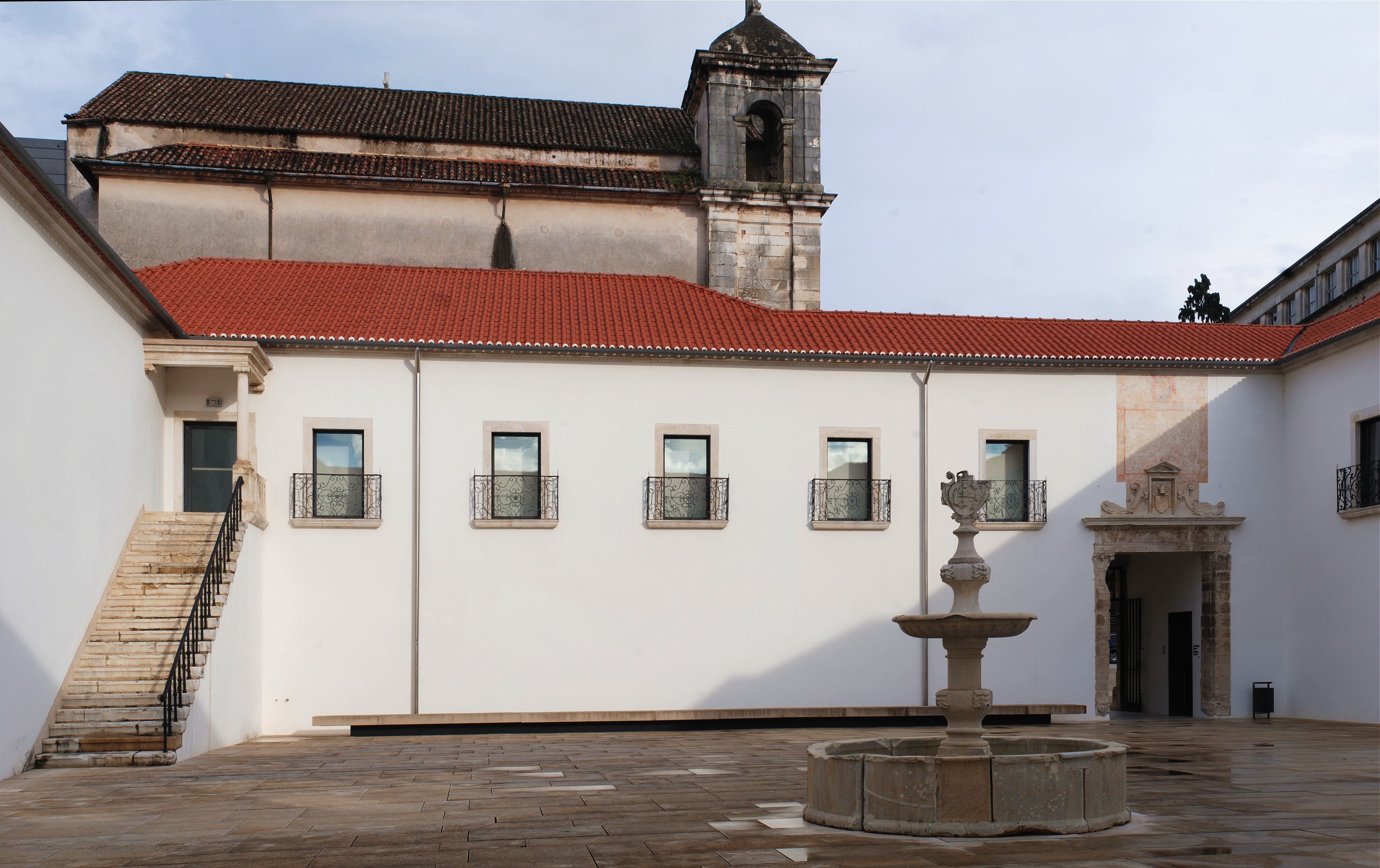 National Museum Machado de Castro, Coimbra (Portugal). detail of the courtyard. In the background the Church of the Saviour
