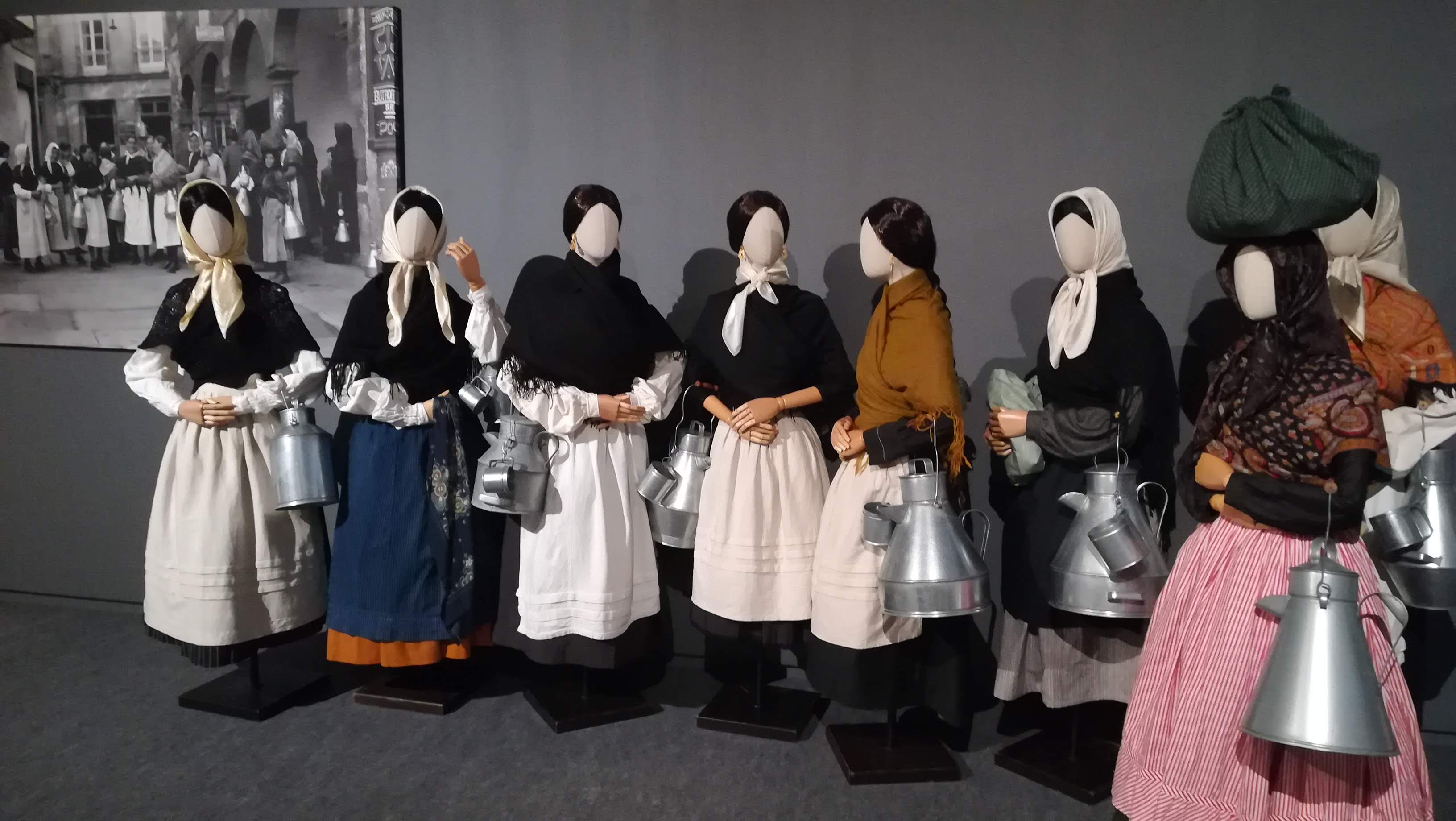 Photos of an exhibition of traditional folk costumes at the Museum of Pontevedra, Galicia, 2022, inspired by Ruth M. Anderson's photographs for the Hispanic Society of America, 1920s to 1940s