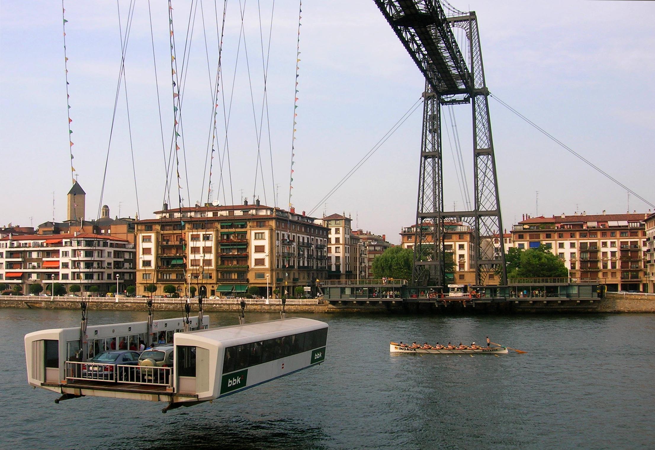 A trainera under the transporter Bizkaia Bridge.