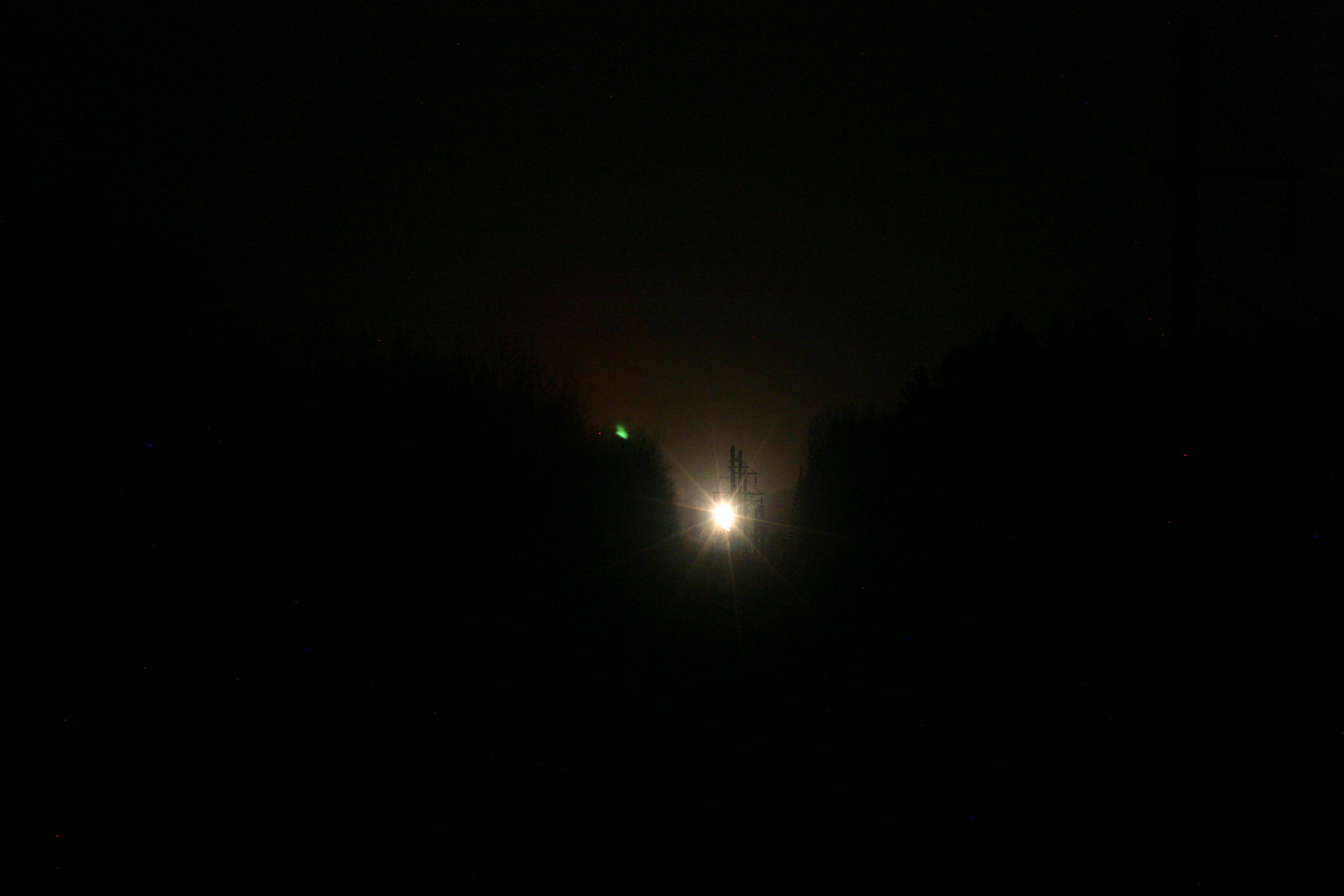 Picture of the Paulding Light taken on November 3, 2007.
The green spot is actually a star, which is more obvious in another photo I have.