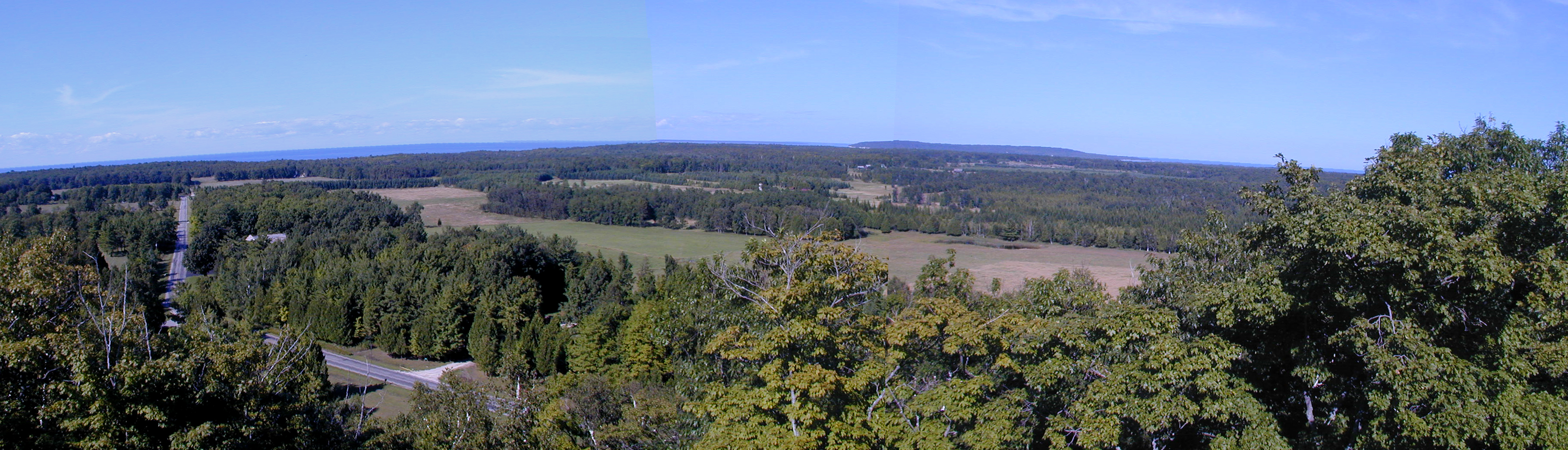 View from the lookout tower from north through east. The lookout is at Mountain Park and is on a hill close to the center of the island.