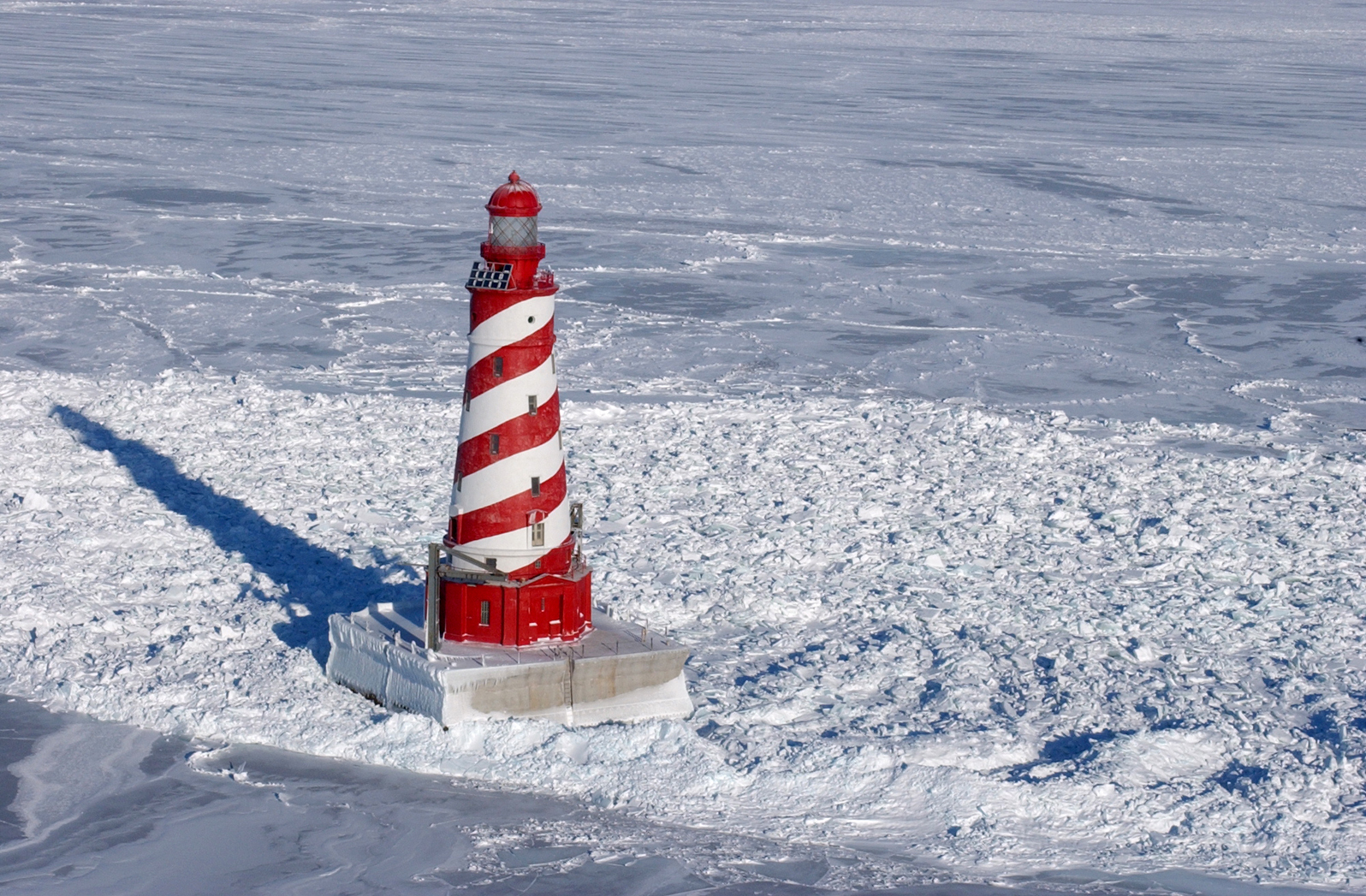 The White Shoal Light in Lake Michigan in the depths of winter.
