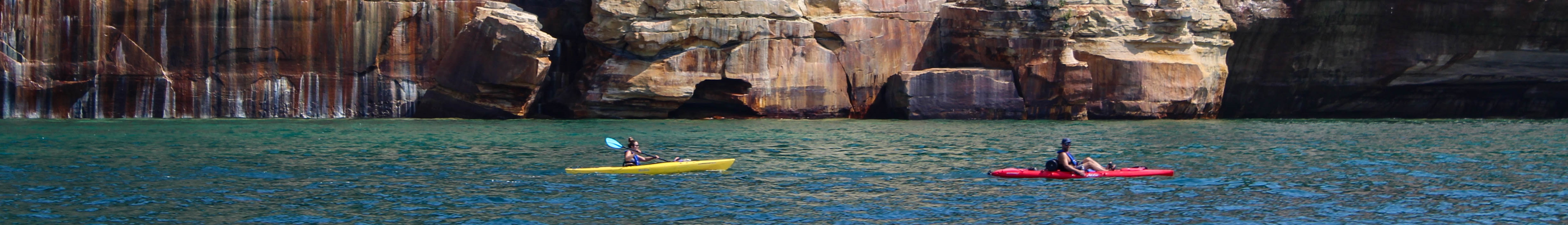 Kayakers paddling along tall cliff faces
Pictured Rocks National Lakeshore in Michigan
Keywords: Pictured Rocks National Lakeshore; Pictured Rocks; PIRO; Michigan; Lake Superior; lakes; boating; paddling; recreation
