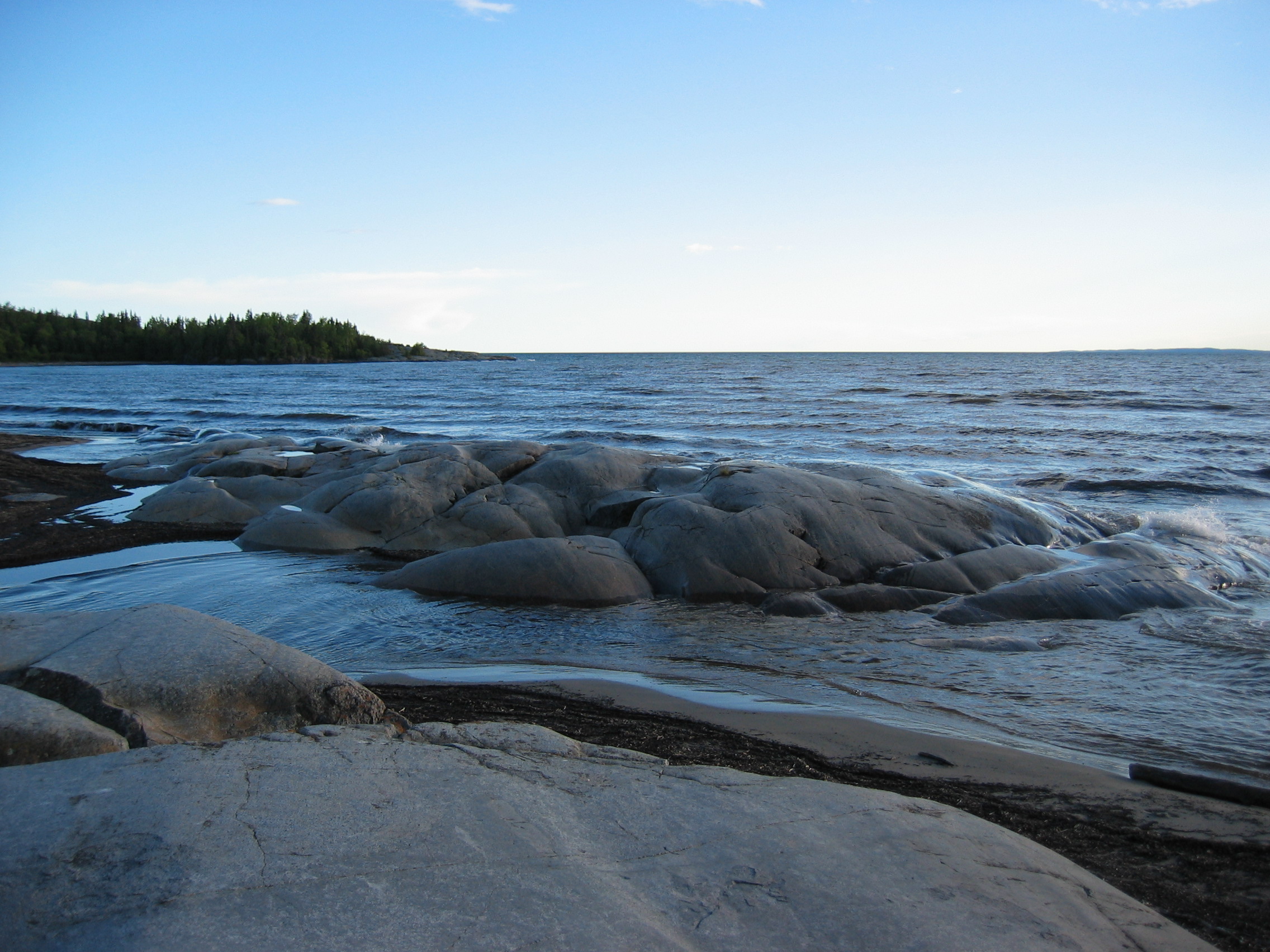 Late afternoon view of rocks on the north shore of Lake Superior at Neys Provincial Park, Ontario, Canada in June 2004