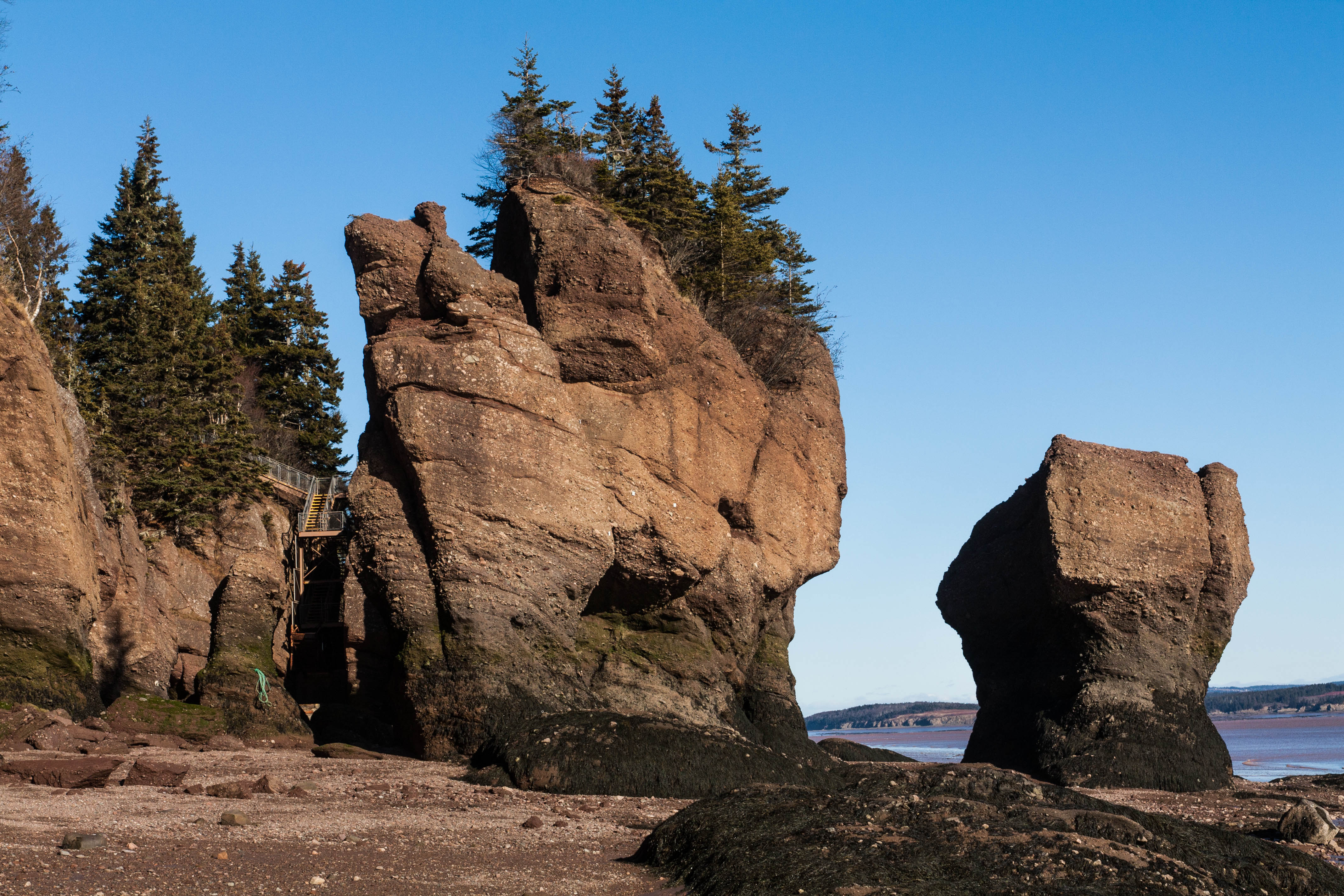 Tilted layers of sandstone at Hopewell Rocks in the Bay of Fundy in Nova Scotia, Canada.