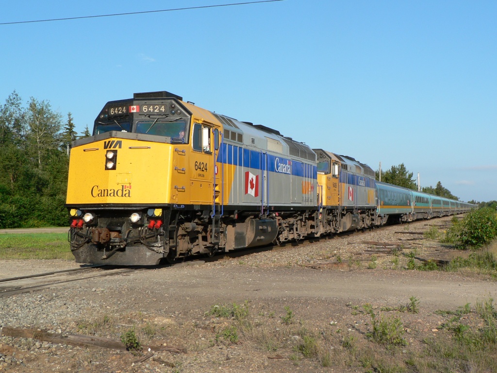Via Rail train 14, the eastbound Ocean, makes a station stop at Jacquet River, New Brunswick, on a sunny summer morning in July, 2006.
