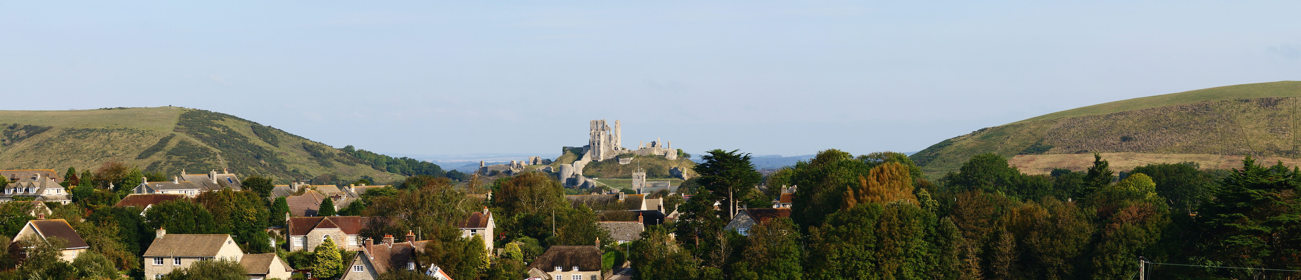 A panorama showing Corfe Castle &amp; its setting in Dorset, UK.