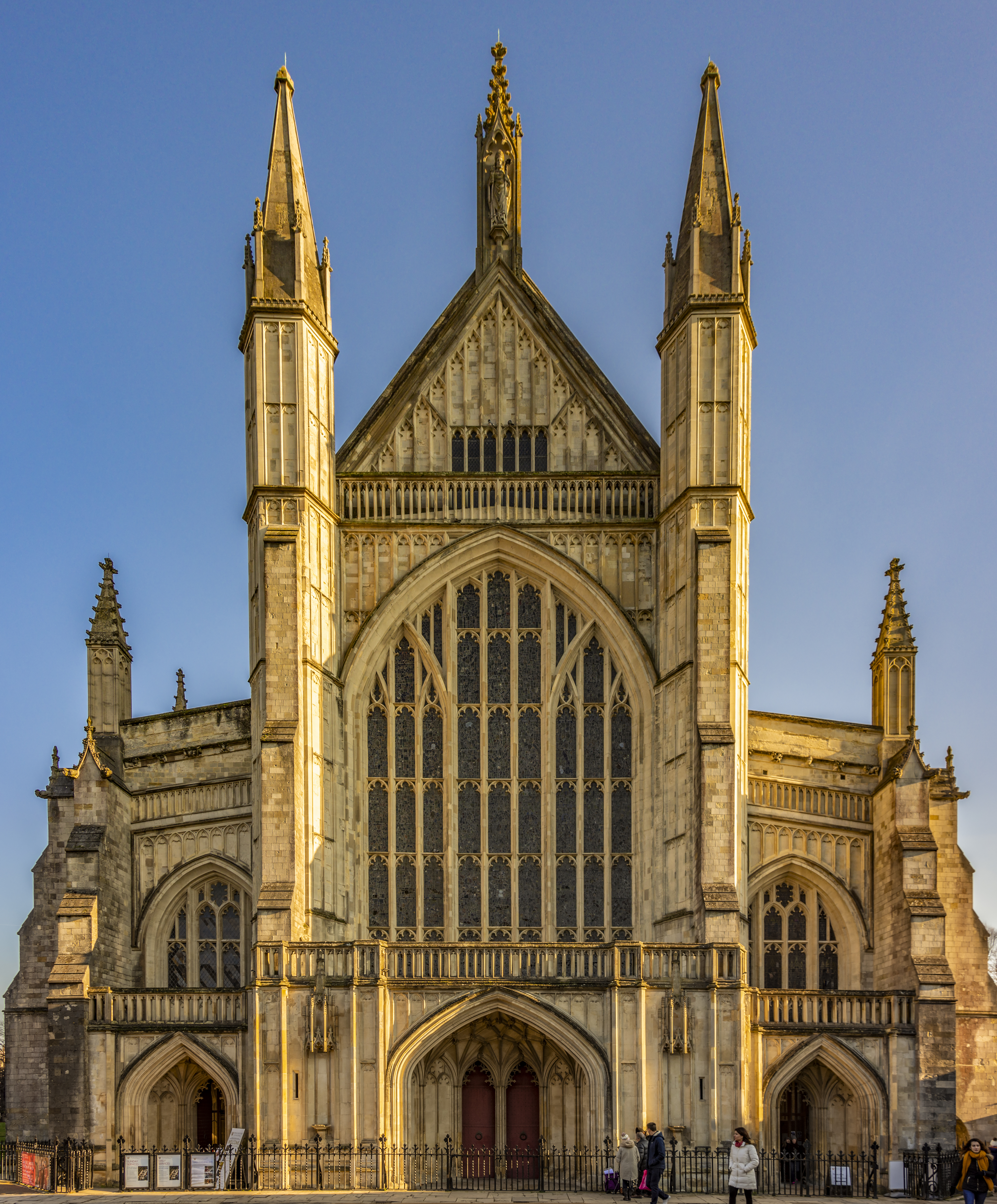 The west facade of Winchester Cathedral at sunset