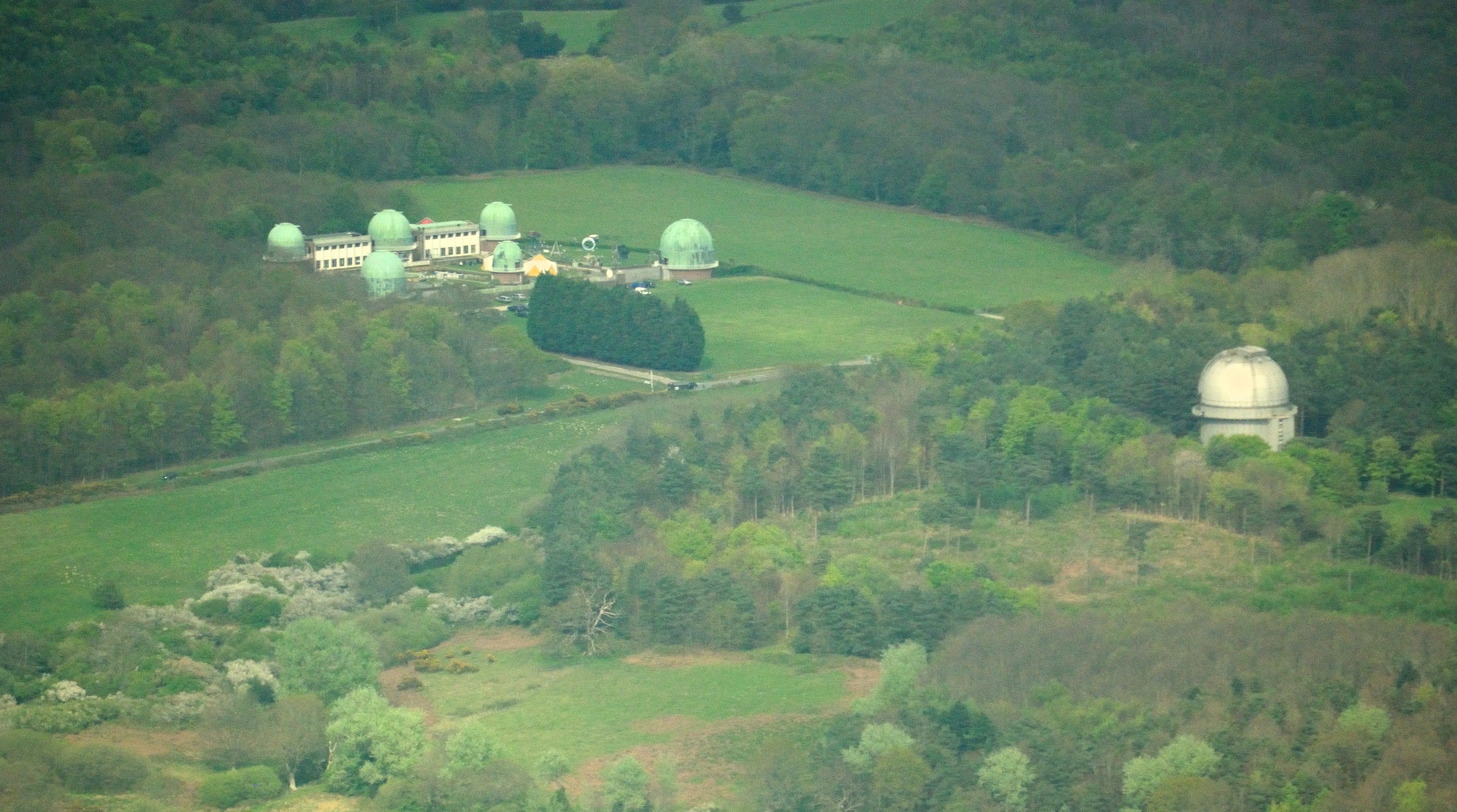 Aerial view of the Observatory Science Centre on the Herstmonceux castle grounds (East Sussex, England). Currently a science exhibit, this site was home to the Royal Greenwich Observatory from 1948 until 1990. Nikon D60 f=200mm f/6.3 at 1/2500s ISO 800. Processed using Nikon ViewNX 1.5.2 and GIMP 2.6.6.