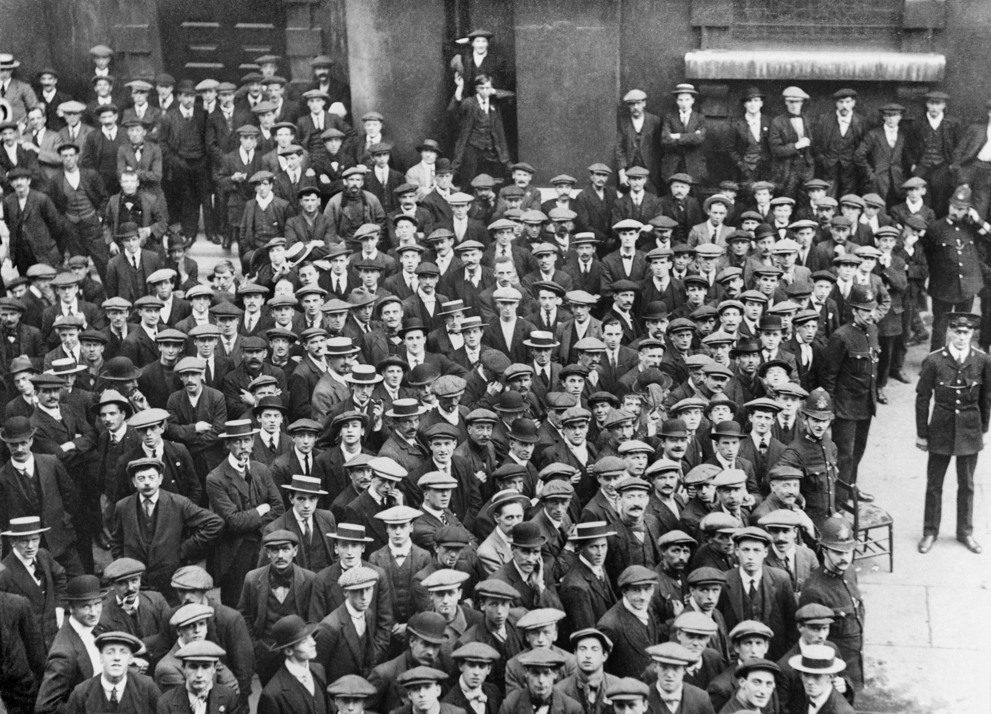 British volunteers for "Kitchener's Army" waiting for their pay in the churchyard of St. Martin-in-the-Fields, Trafalgar Square, London.
