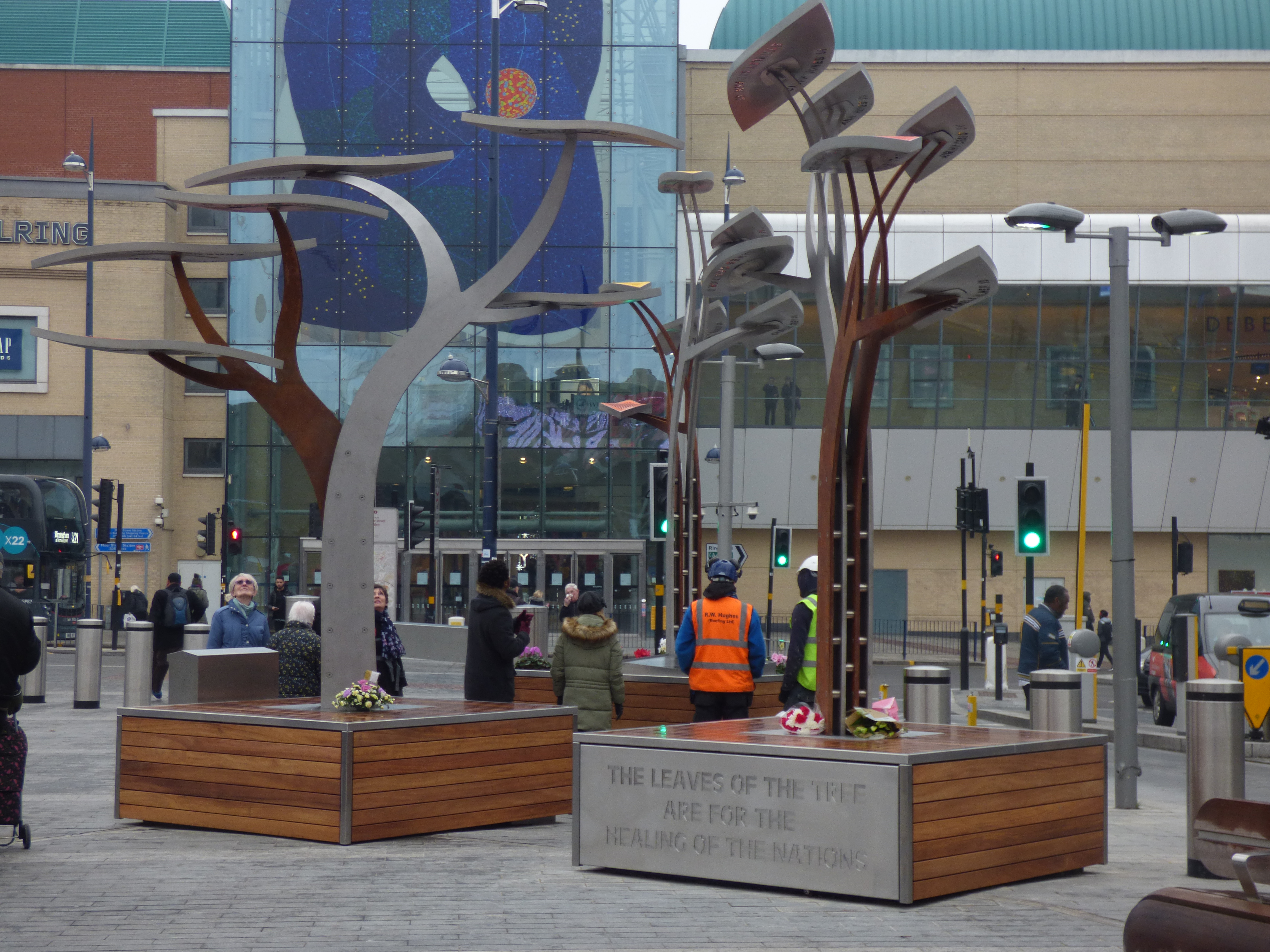 Seen at the public square outside of Birmingham New Street Station is the Birmingham Pub Bombings Memorial.
It was unveiled on the evening of the 21st November 2018, 44 years to the day that the attack happened at two pubs on New Street.
The artwork is by Anuradha Patel.

There is 21 stainless steel leaves with the names of the victims on them.