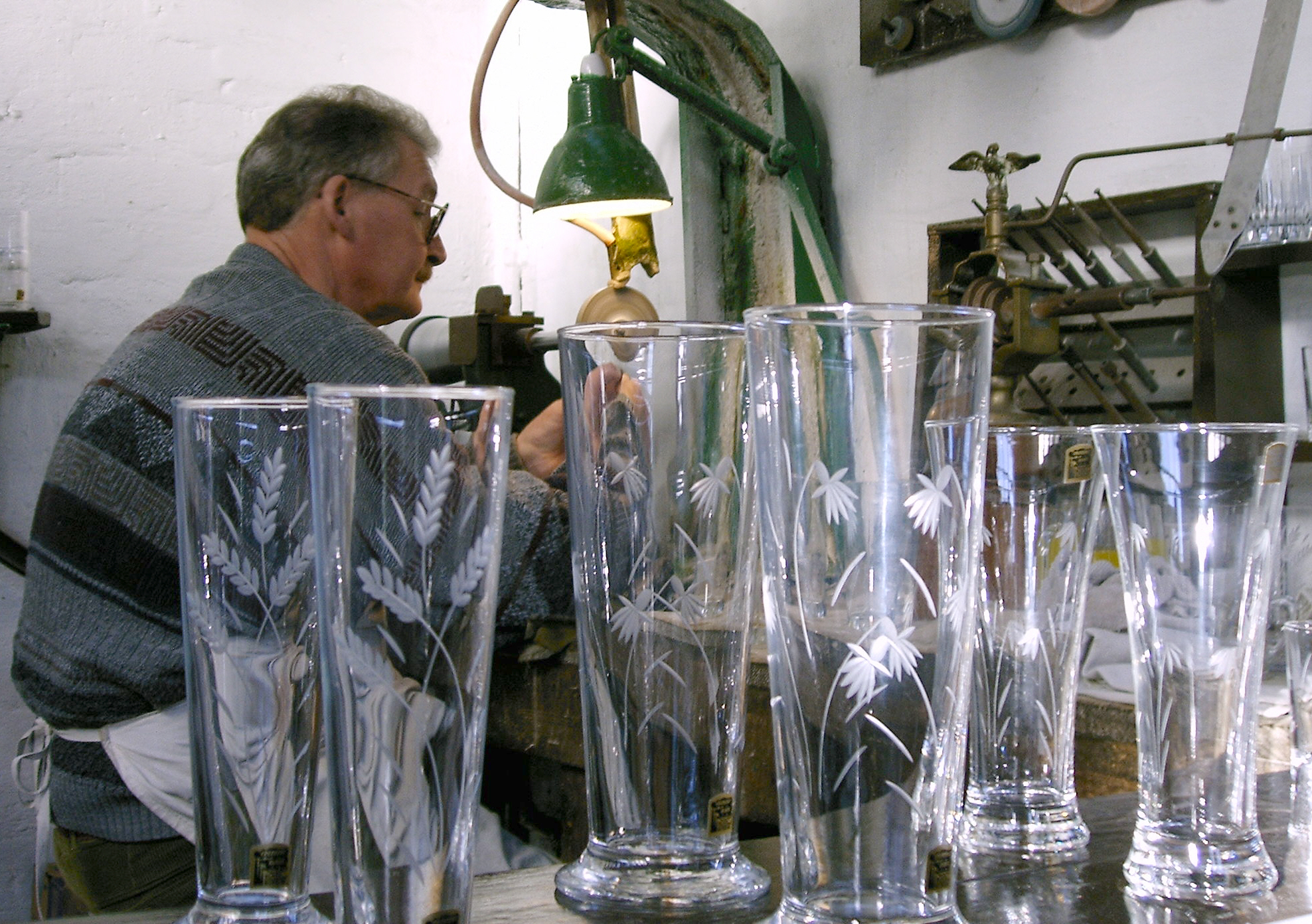 Glass engraver at Black Country Living Museum.  This is one of the skilled trades demonstrated at the Museum.