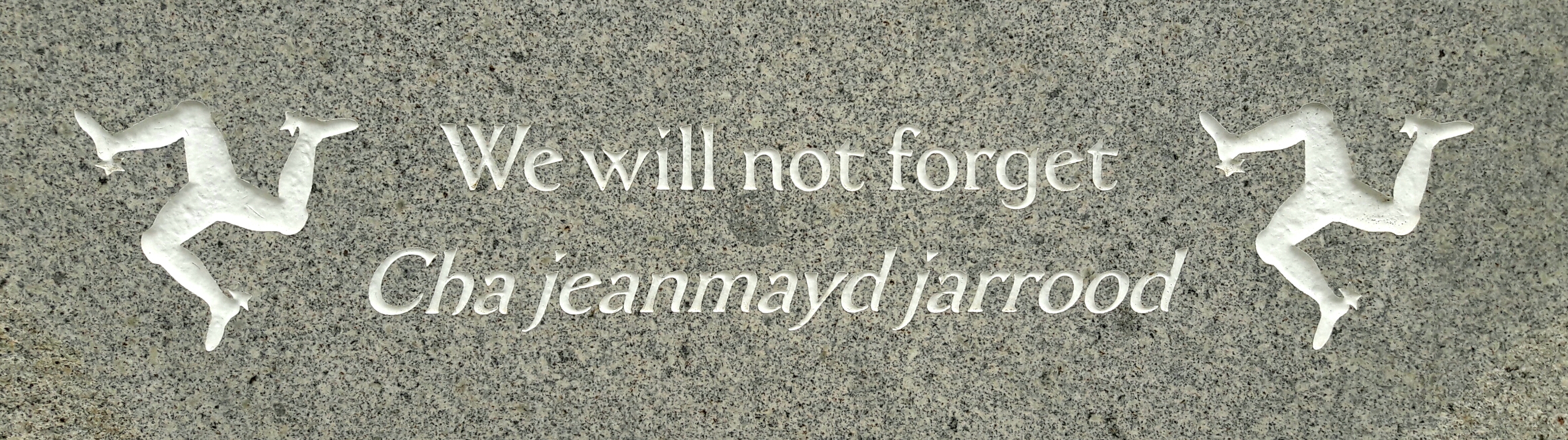 The Manx and English inscription on the Summerland Disaster memorial.