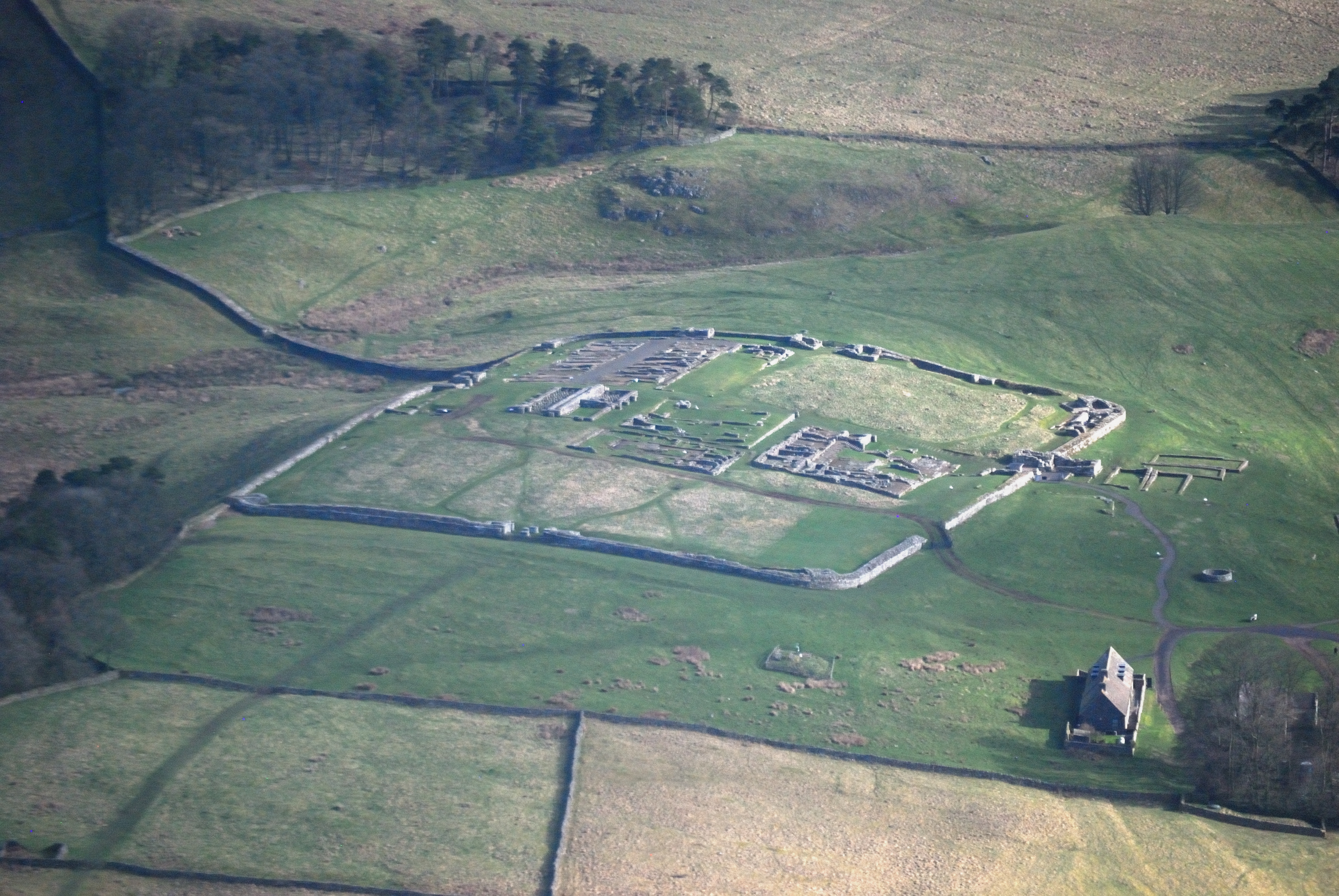 Aerial photograph of Housesteads Roman Fort by Hadrian's Wall, Northumberland, England. Nikon D60 f=200mm f/5.6 at 1/1600s ISO 800. Processed using Nikon ViewNX 2.1.2.
