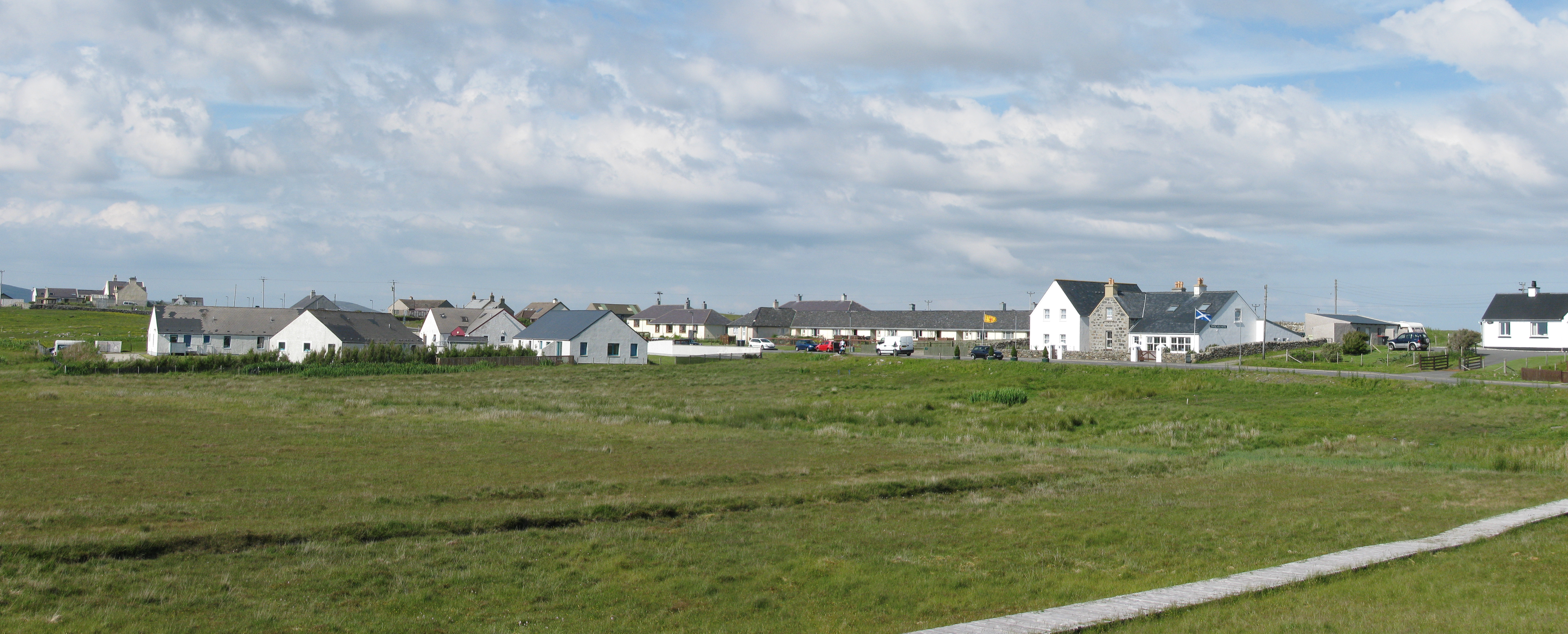 The village of Carinish (North Uist) with the battlefield of Carinish in the foreground.