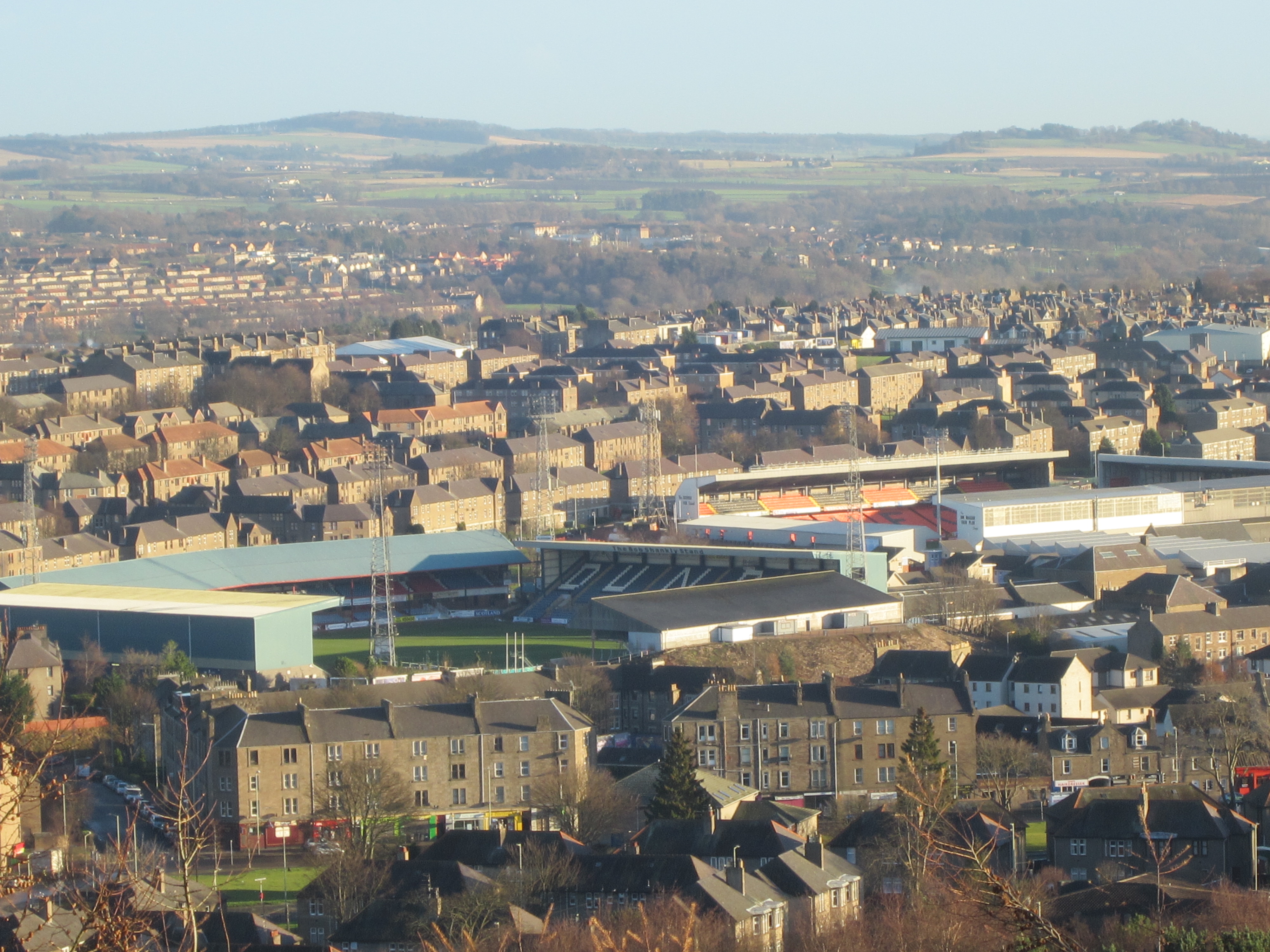 The two football stadiums in Dundee, viewed from the volcanic peak of Dundee Law. Left: Dens Park, home of Dundee FC. Right: Tannadice Park, home of Dundee United.