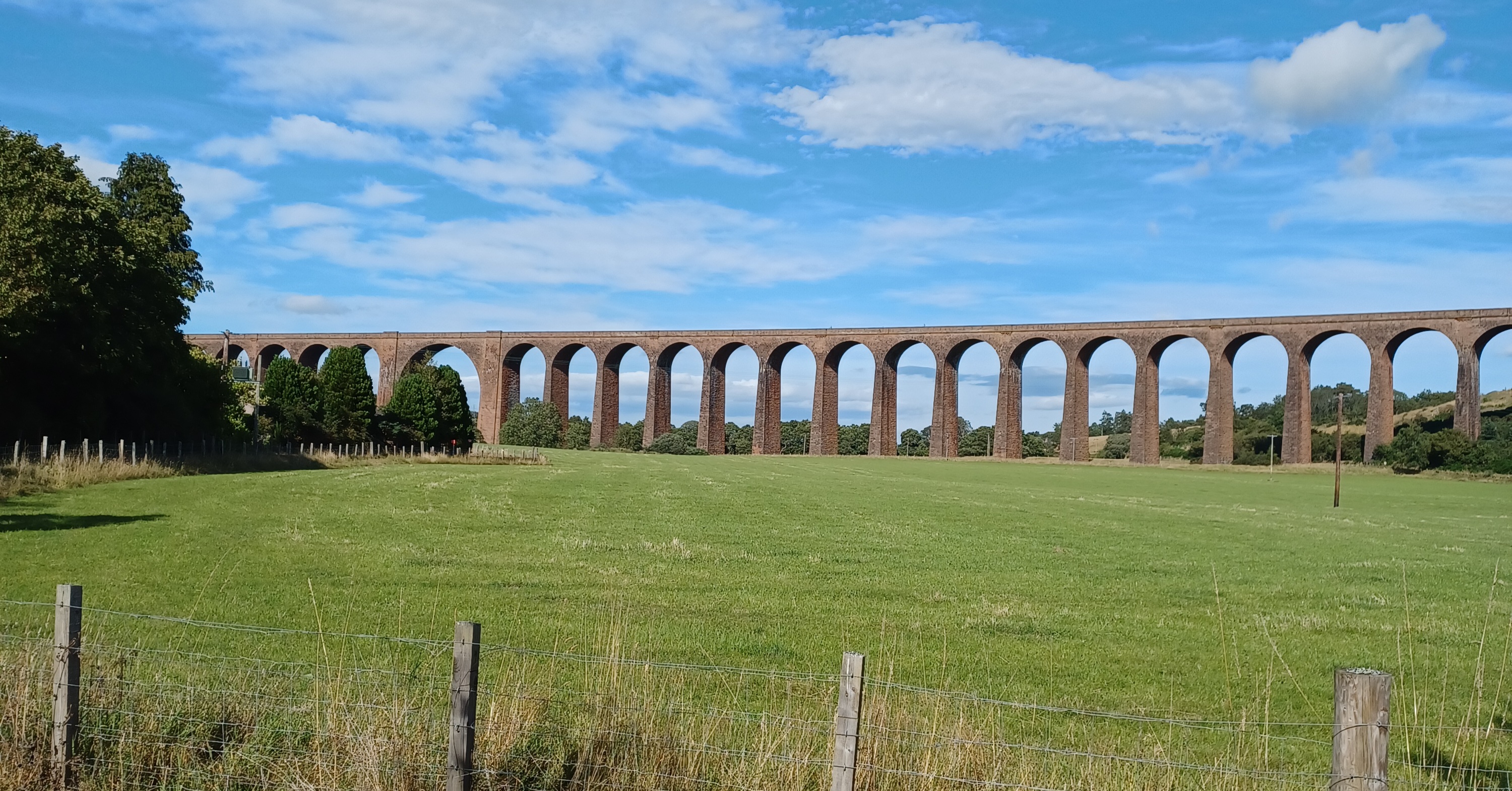Clava Viaduct is a masonry viaduct built in 1898 for trains. It is in Inverness, Scotland. This photo taken in August 2022