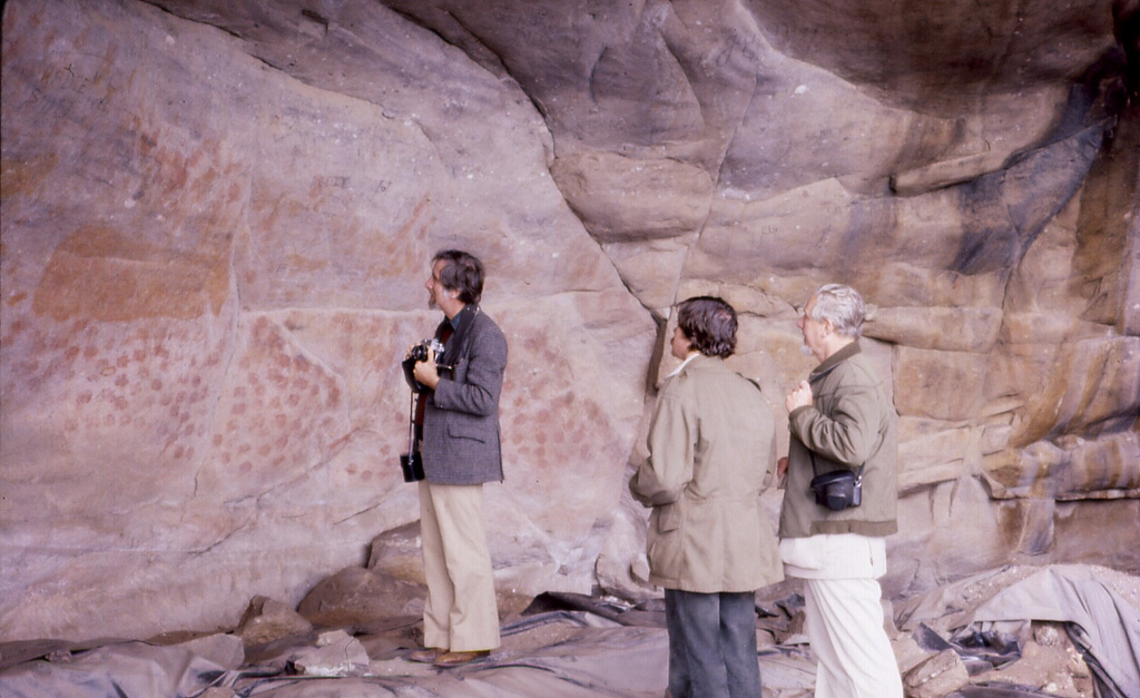 Rock paintings at Eland's Bay Cave, South Africa
Photo taken in 1979. From left to right, Merrick Posnansky, John Parkington and J. Desmond Clark.