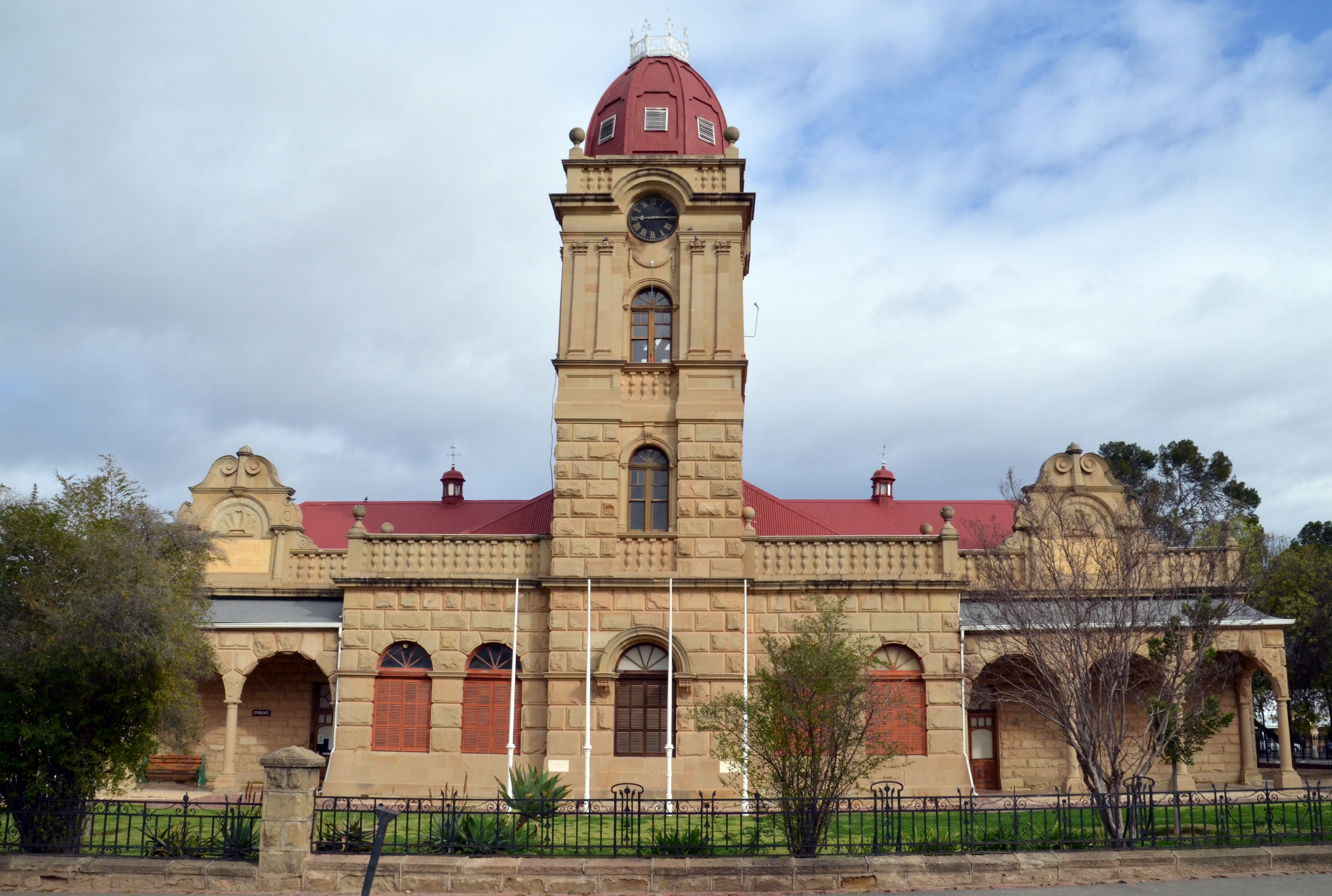 C P Nel Museum, Baron van Rheede Street, Oudtshoorn. Designed in part by Bullock and Vixseboxe, the well known architects, it reflects the former's copiousness and the latter's Transvaal Republic influence. Especially worthy of note is the facade, with its harmonious blending of styles.