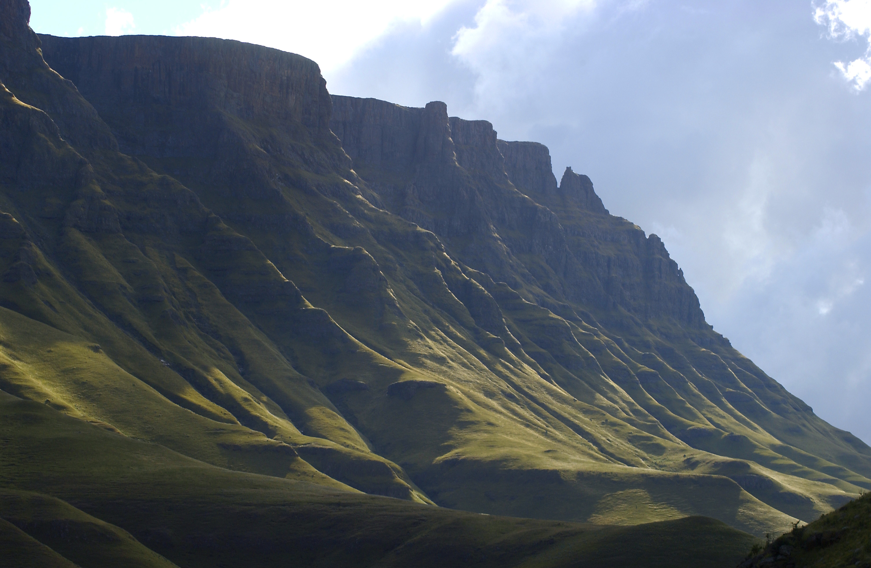 The mountains of the Sani Pass in the Drakensberg Mountains between South Africa and Lesotho
--Mark peacock 07:24, 26 May 2007 (UTC)