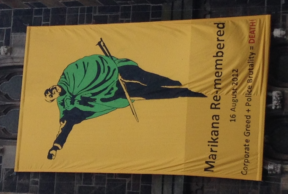 Church on Green Market Square in Cape Town, South Africa with a banner commemorating the Marikana massacre
