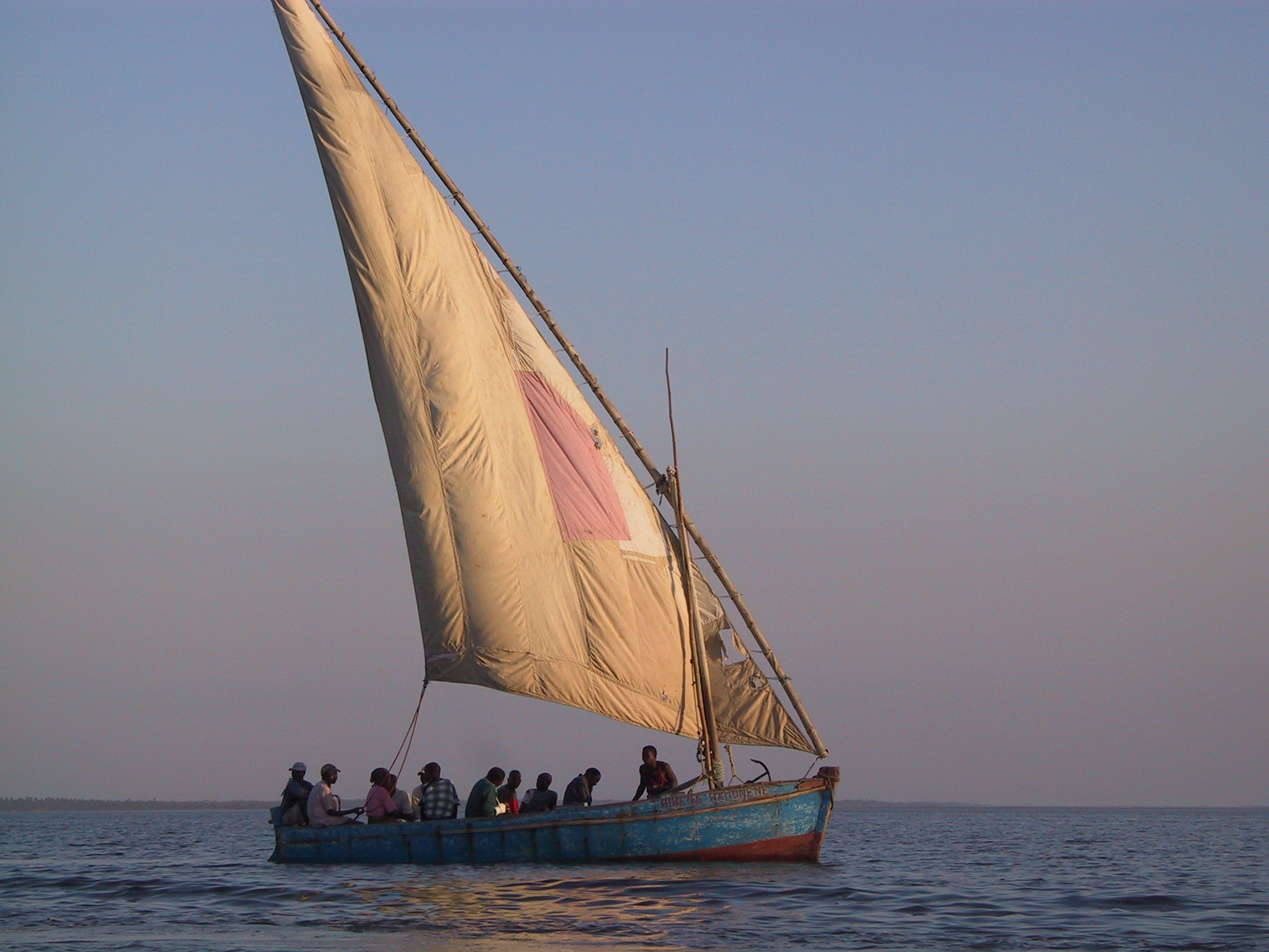 Dhow ferrying passengers from Inhambane to Maxixe in Mozambique. It is using a lateen sail, with the lateen sail currently in the "bad tack" (with the sail pressed against the mast.)   Copyright © 2006 by Steven G. Johnson and donated to Wikipedia under the GFDL.