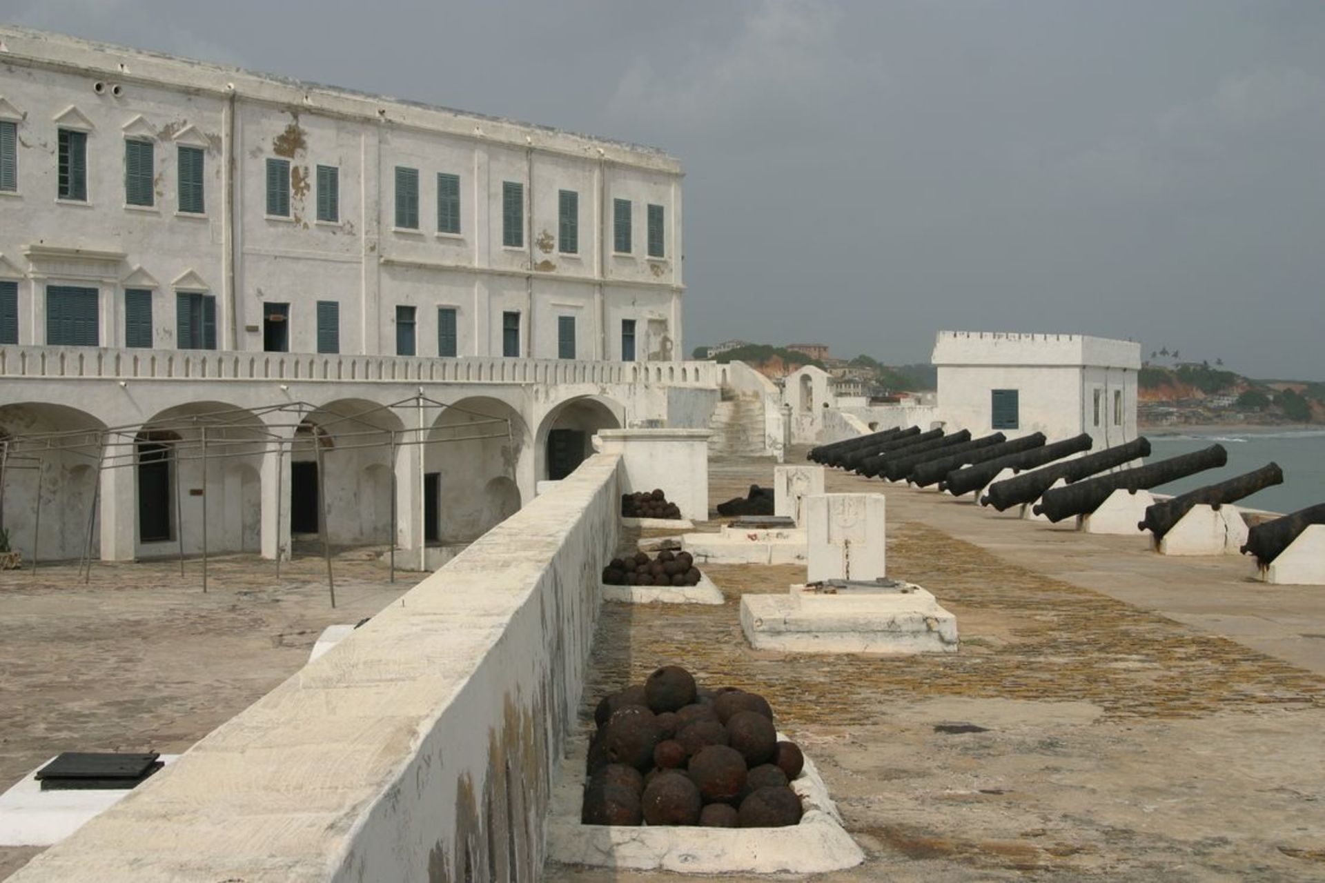 The Castle was erected by the Portuguese in 1482 as Castelo de São Jorge da Mina (St. George of the Mine Castle), also known as Castelo da Mina or simply Mina (or Feitoria da Mina), in present-day Elmina, Ghana (formerly the Gold Coast). It was the first trading post built on the Gulf of Guinea, and the oldest European building in existence south of the Sahara.[1] First established as a trade settlement, the castle later became one of the most important stops on the route of the Atlantic slave trade. The Dutch seized the fort from the Portuguese in 1637, after an unsuccessful attempt to the same extent in 1596, and took over all of the Portuguese Gold Coast in 1642. The slave trade continued under the Dutch until 1814. In 1872, the Dutch Gold Coast, including the fort, became a possession of Great Britain.