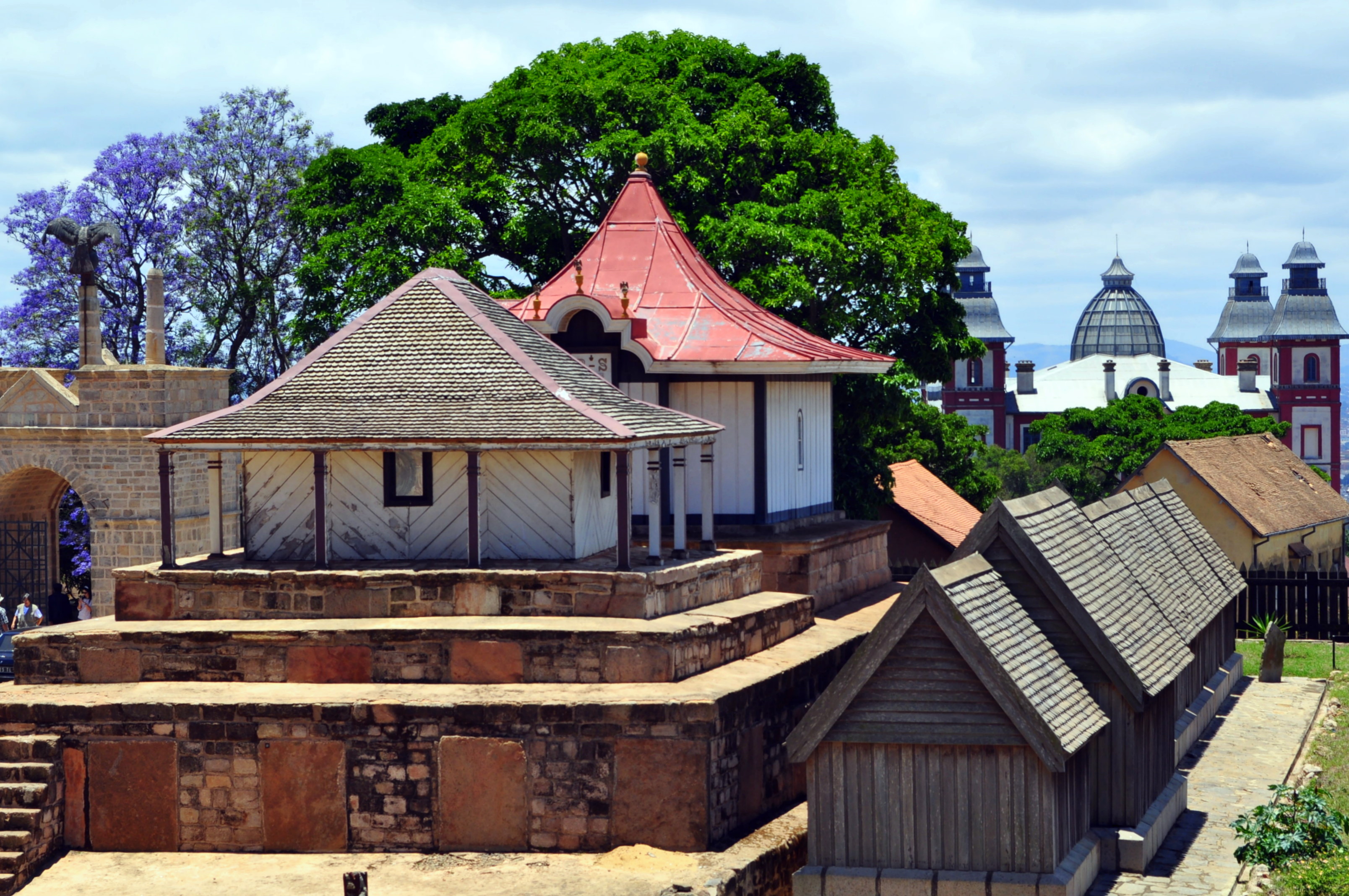Left to right: Main gate with voromahery (eagle) sculpture, royal tombs of Radama I &amp; Rasoherina, and the Fitomiandalana (seven aligned tombs) at the Rova of Antananarivo, Madagascar.