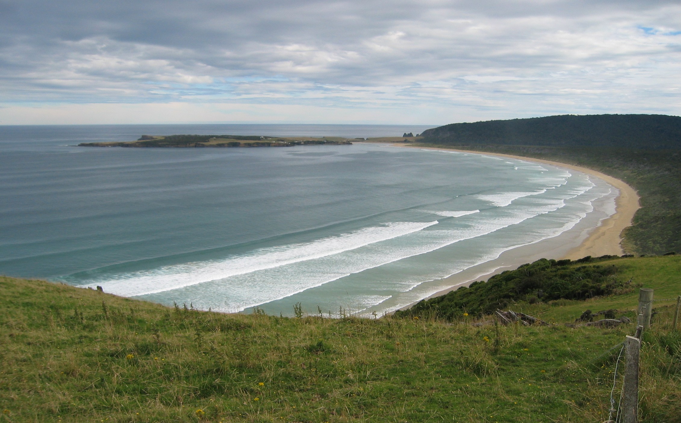 Looking over Tautuku Bay towards the Tautuku Peninsula, in the Catlins, New Zealand. The peninsula hosted a whaling station in the 1830s and 1840s.