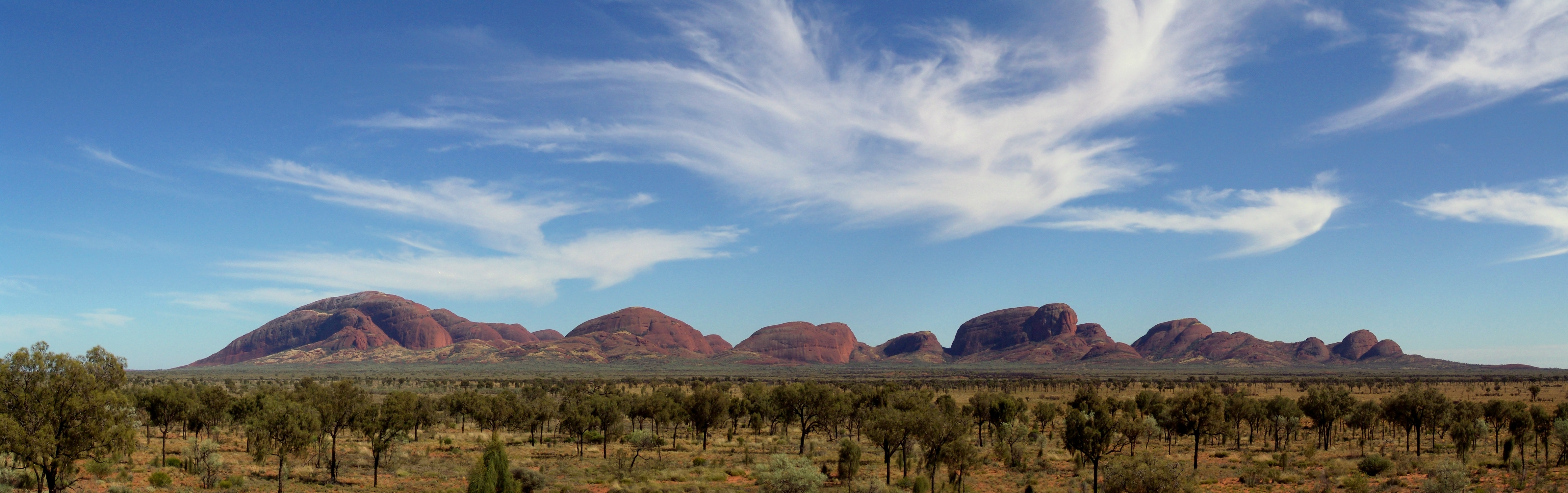 Kata Tjuta or the Olgas is a rock formation near Uluru/Ayers Rock. Panorama of three landscape images.