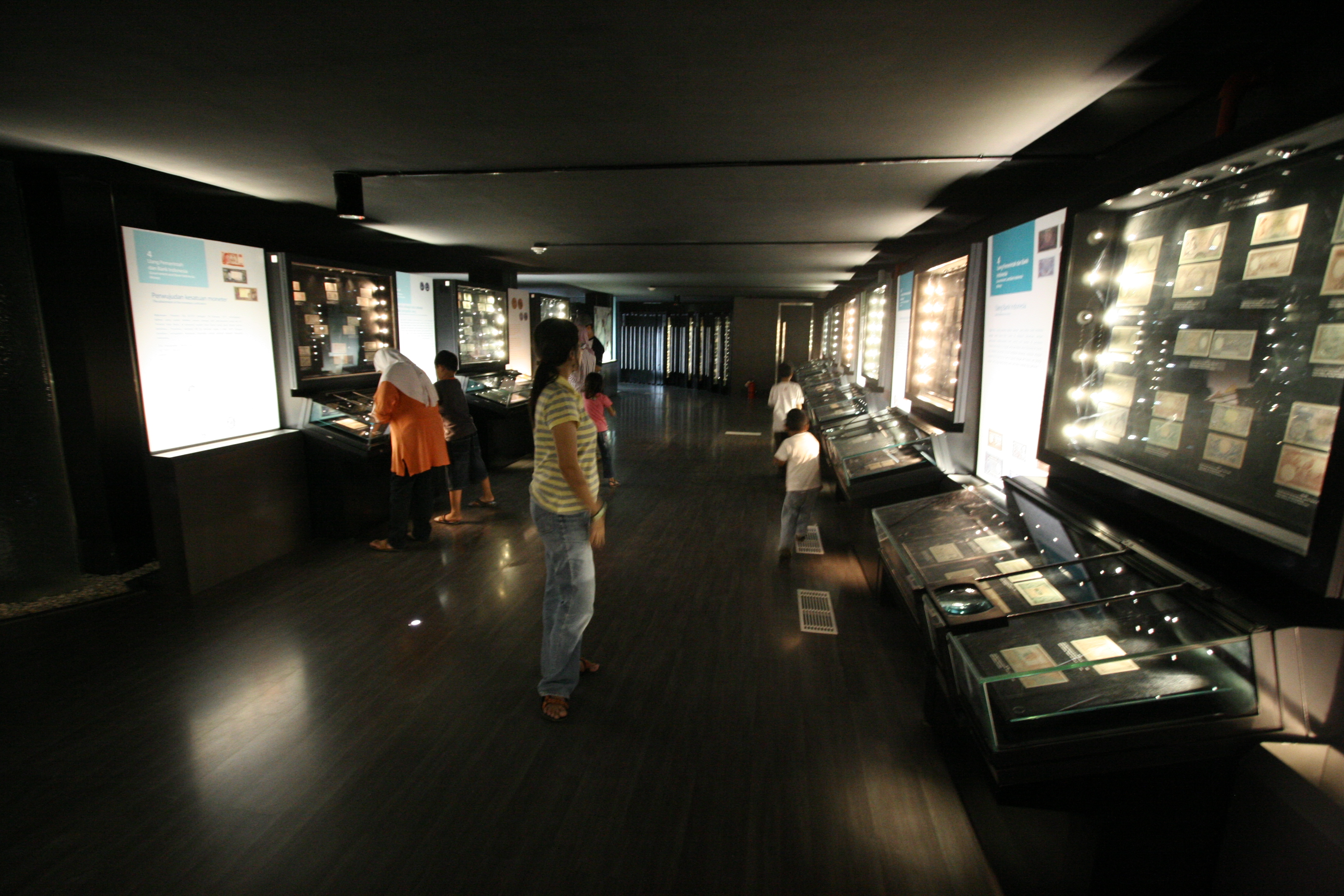 Bank of Indonesia Museum, Jakarta displays a comprehensive collection of Indonesian bank notes through the ages. in the back, a collection of notes from around the world.