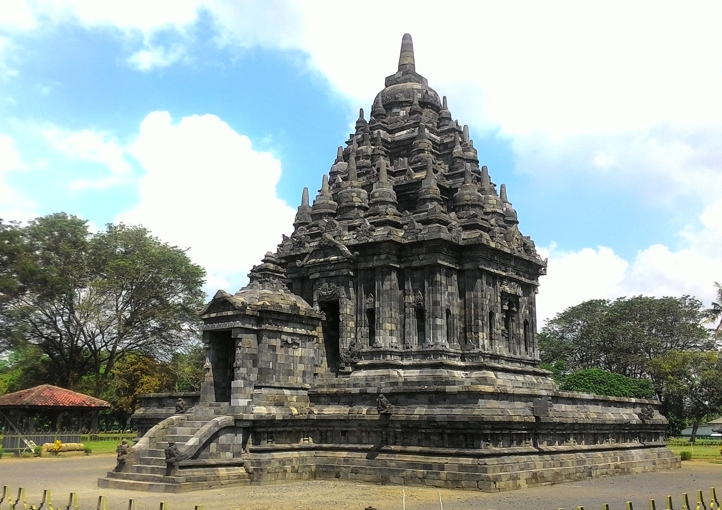 A corner view of Candi Bubrah, a 9th century Javanese Buddhist temple in 2019, after the reconstruction. The temple is located in Prambanan Archaeological Park, Central Java, Indonesia.