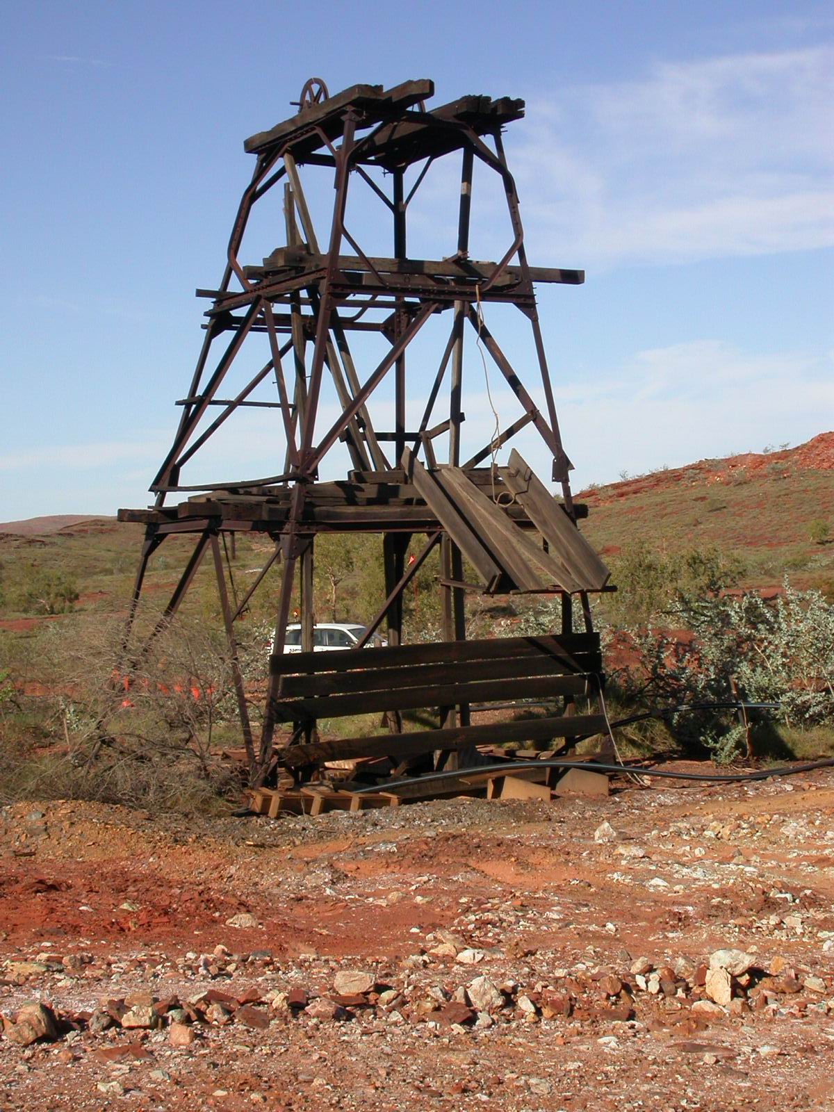 Author: Rolinator. This is an image of the old ~1920 or 1960's's head frame of the underground workings, Whim Creek Mine, Western Australia. Image released for free use.