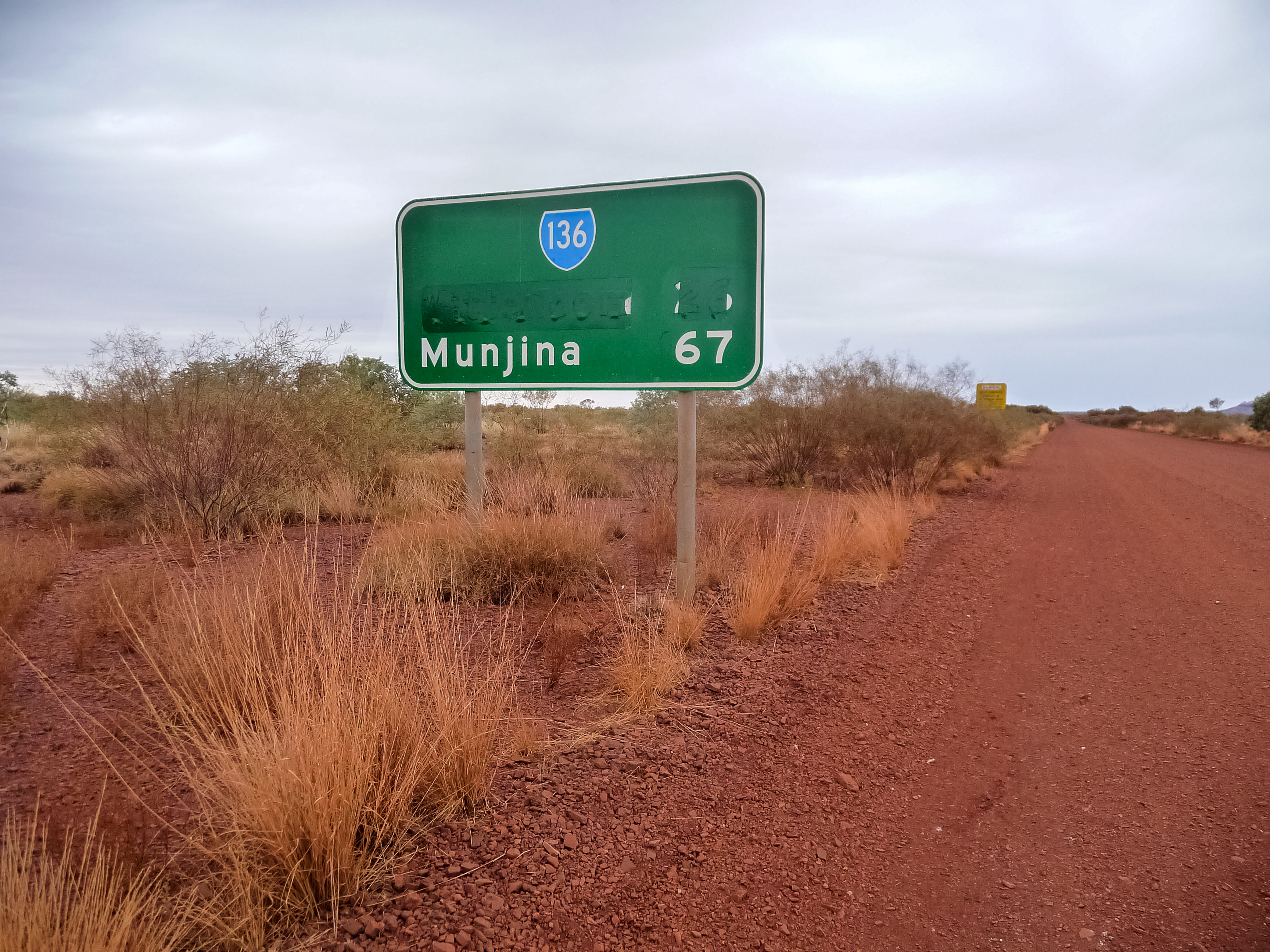 Road sign where Wittenoom, Western Australia has been removed