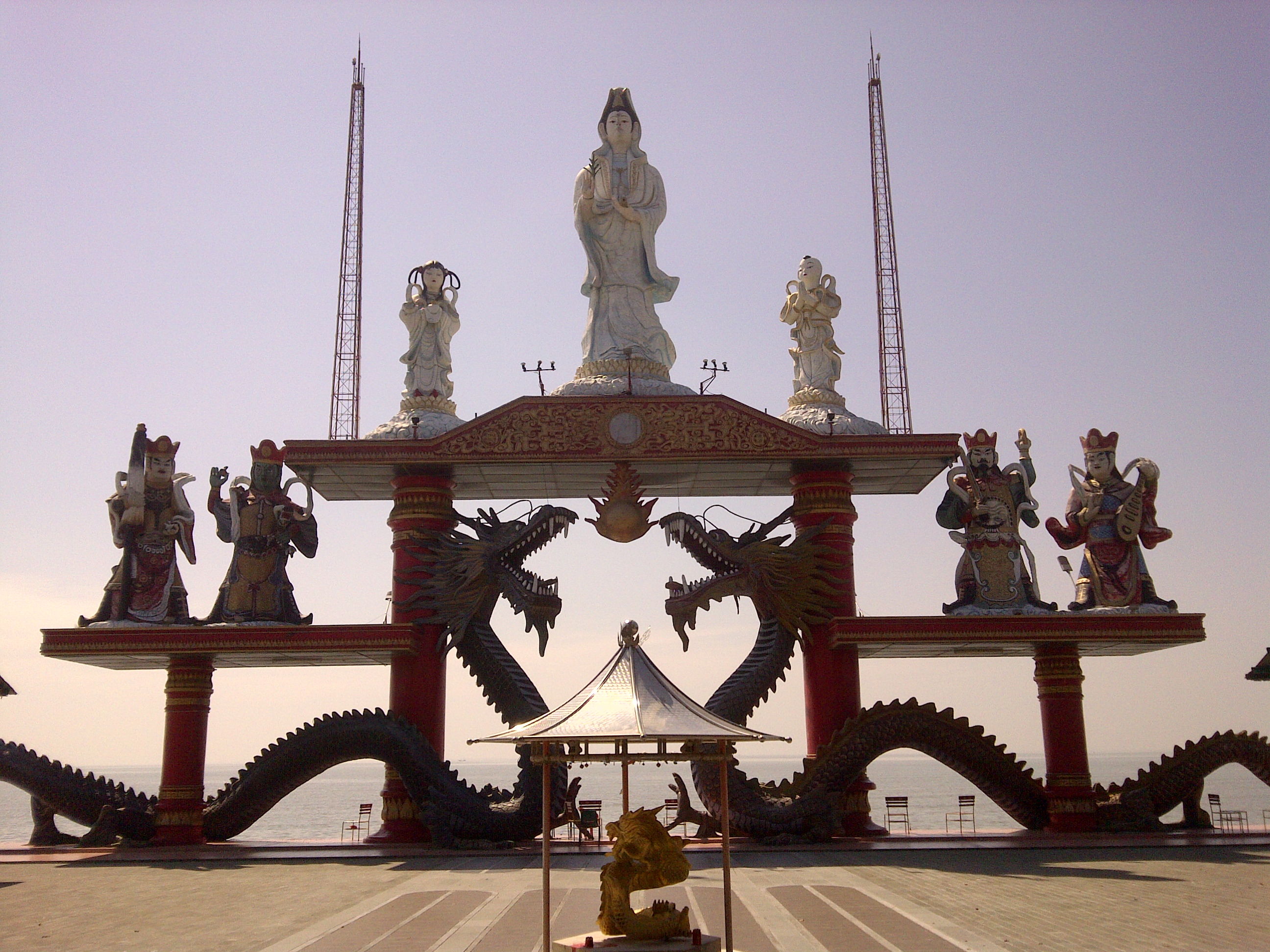 Guan Shi Yin Bodhisattva statue flanked by Nagakanya and Sudhana (top) / Bottom level shows 4 Heavenly Kings of Sanggar Agung Temple, Surabaya-Indonesia