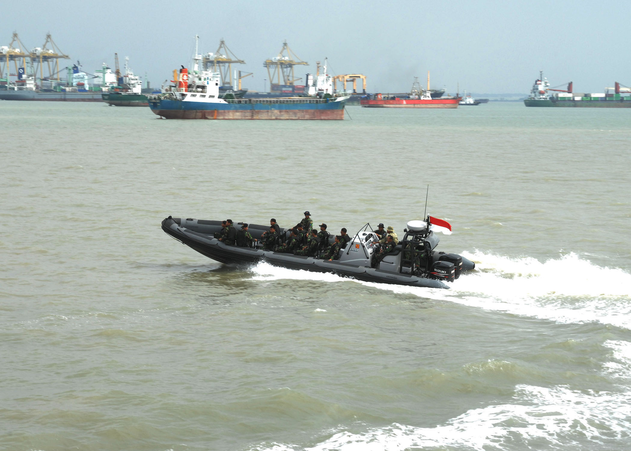 Indonesian sailors assigned to the corvette KRI Sultan Iskandar Muda depart a visit, board, search and seizure exercise with the U.S. Navy and Coast Guard in a rigid hull inflatable boat during Cooperation Afloat Readiness and Training (CARAT) Indonesia 2012 May 31, 2012, in Surabaya, Indonesia. CARAT is a series of bilateral exercises held annually in Southeast Asia to strengthen relationships and enhance force readiness. (DoD photo by Mass Communication Specialist 1st Class Elizabeth Thompson, U.S. Navy/Released)