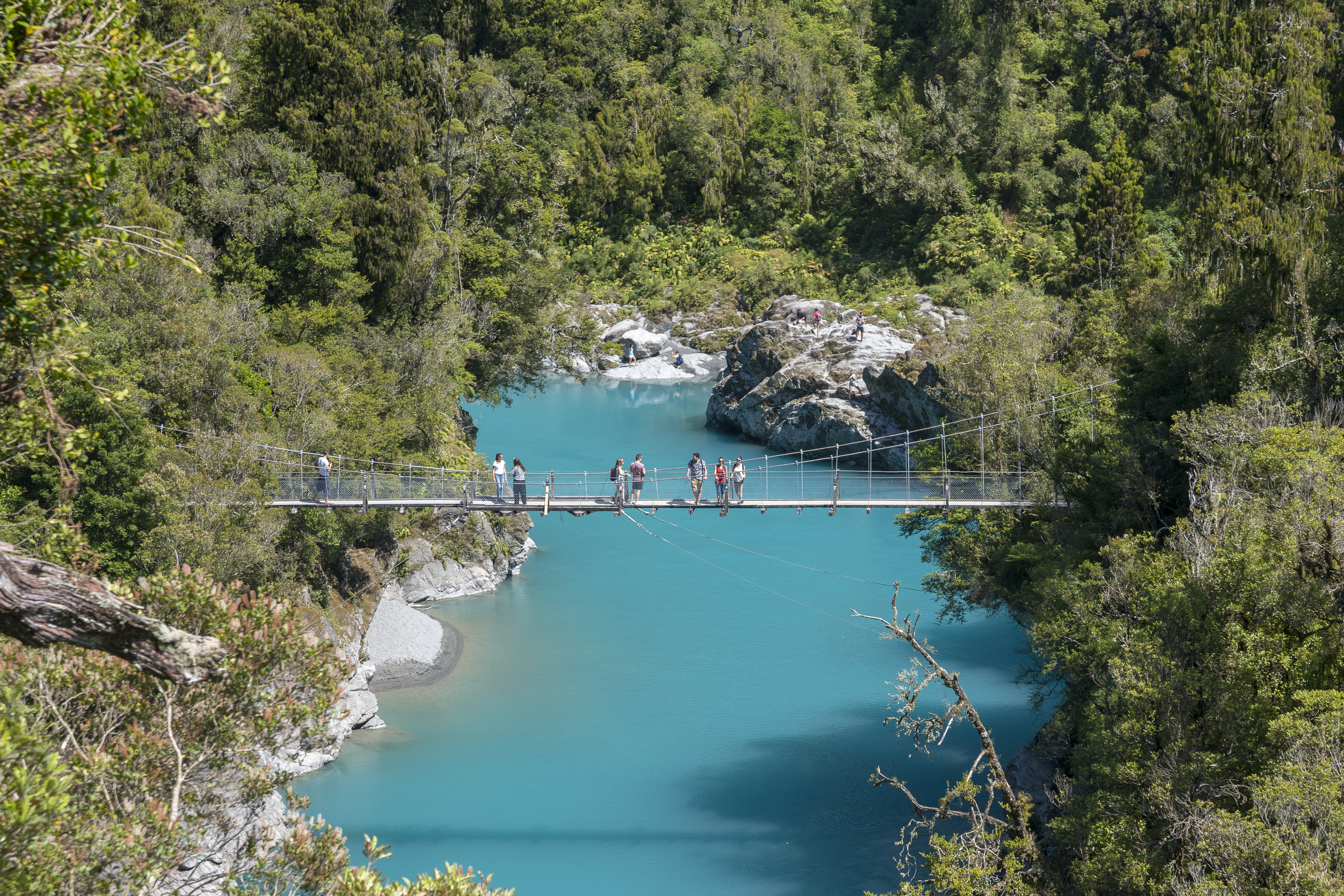 Hokitika Gorge in the Hokitika Scenic Reserve, West Coast, New Zealand. The reserve is 33 km east of Hokitika, and contains walking tracks in mature rimu, miro, and kamahi forest, with viewing platforms and a swingbridge across the Hokitika River.