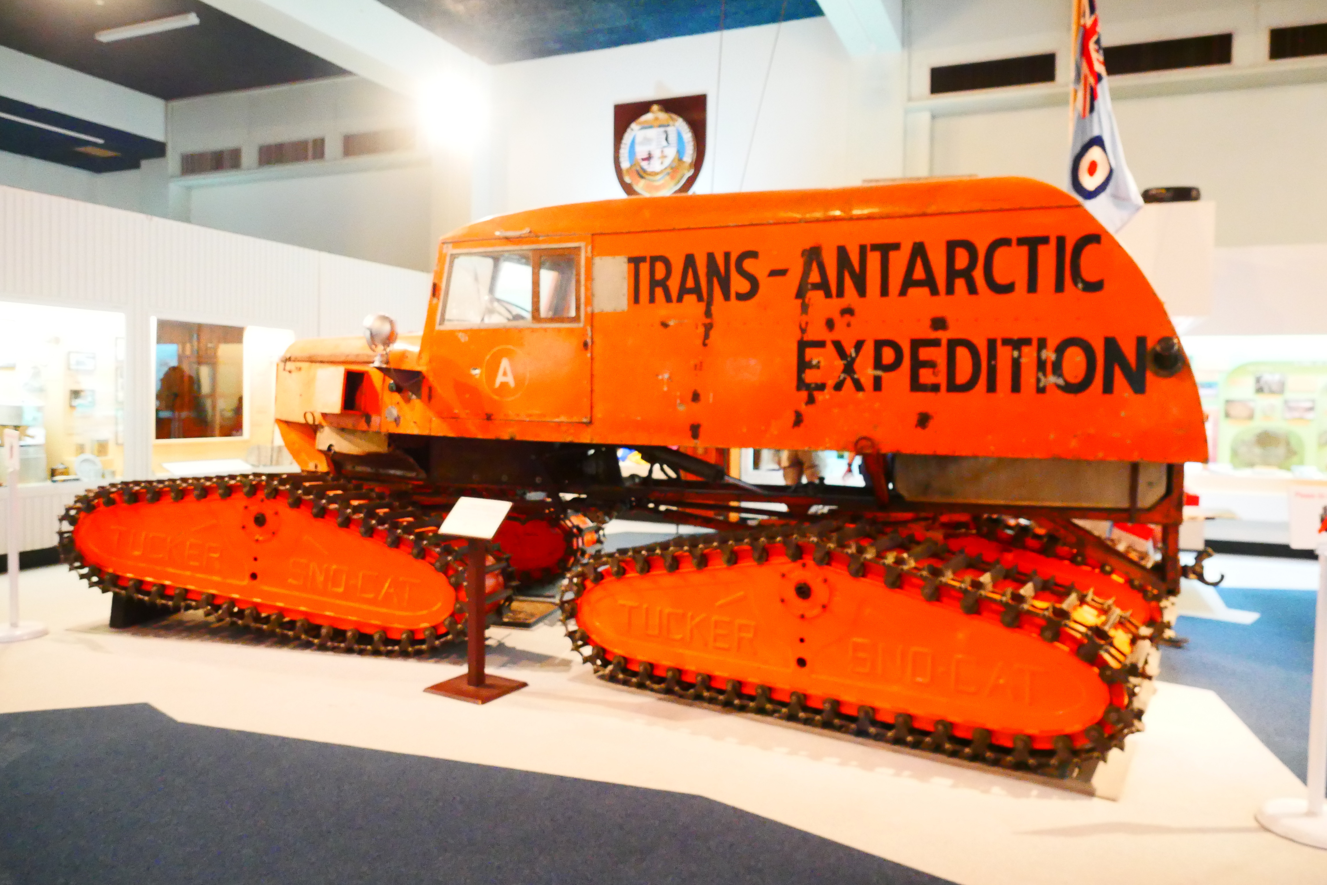 This sno-cat tractor, named Able, was used by Vivian Fuchs, the leader of the Commonwealth Trans Antarctic Expedition (1955–1958). The expedition aimed to make the first overland crossing of the Antarctic Continent.
This was to be done with two parties: the Crossing Party and the Ross Sea Party. Vivian Fuchs led the Crossing Party, which would cross the continent from the Weddell Sea to McMurdo Sound via the South Pole. Edmund Hillary led the Ross Sea Party, which supported the Crossing Party by building a support base in McMurdo Sound, laying supply depots and establishing a vehicle route from the Polar Plateau through the Western Mountains back to Ross Island.
The Crossing Party departed from the Weddell Sea on 24 November 1957. After some adventures, including partially falling into a large crevasse, the sno-cat arrived at the South Pole on 19 January 1958. The Crossing Party completed the 3,473 km journey in 99 days and arrived at Scott Base, Ross Island on 2 March 1958. After the crossing, the sno-cat was used at New Zealand’s Scott Base until 1971. It was then shipped to Lyttelton, New Zealand on the HMNZS Endeavour and came into Canterbury Museum.

The sno-cat is 6 metres long, 2.7 metres high and weighs 3.5 tonnes. It is powered by a 134 kilowatt Chrysler motor, has a top speed of 25 km per hour and can pull loads of up to 2.7 tonnes. At peak capacity it consumes 70 litres of fuel for every 100 km travelled.