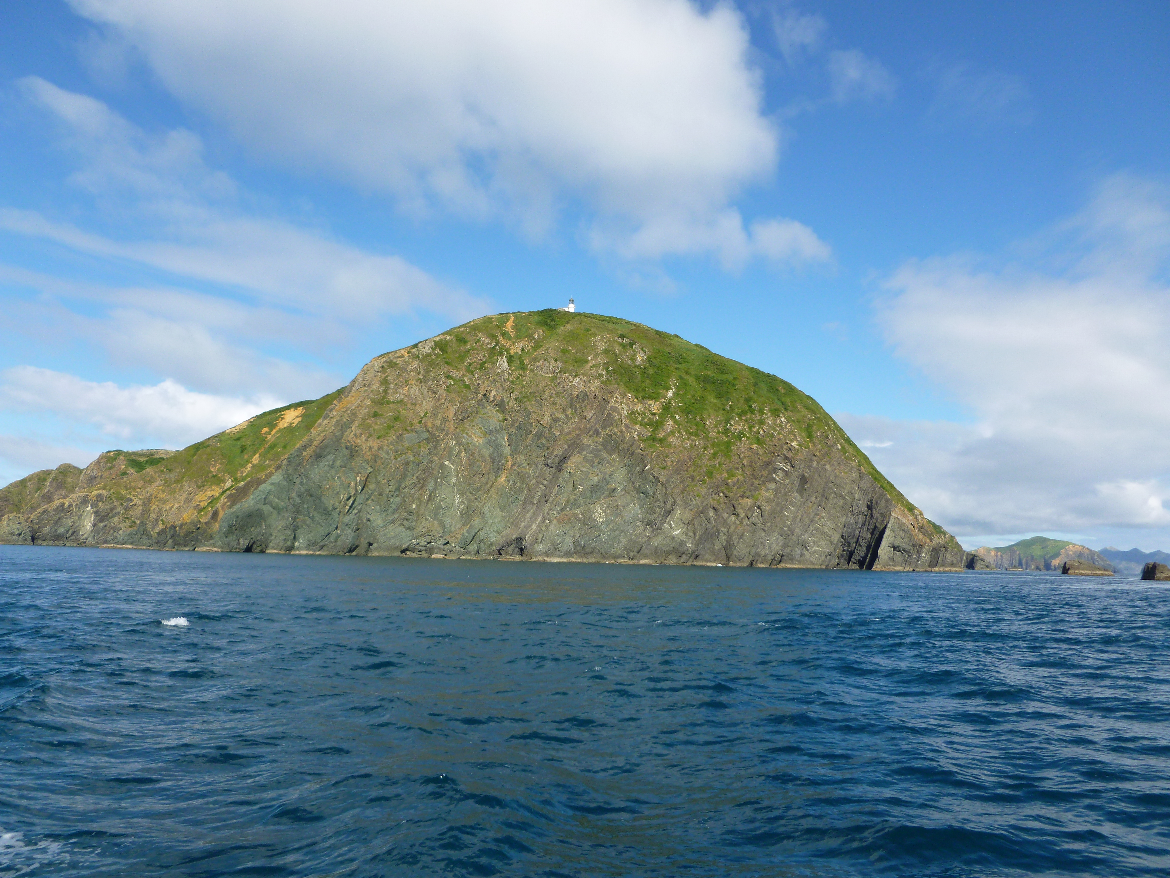 The remote Stephens Island / Takapourewa Lighthouse in Tasman Bay, at the top of South Island of New Zealand