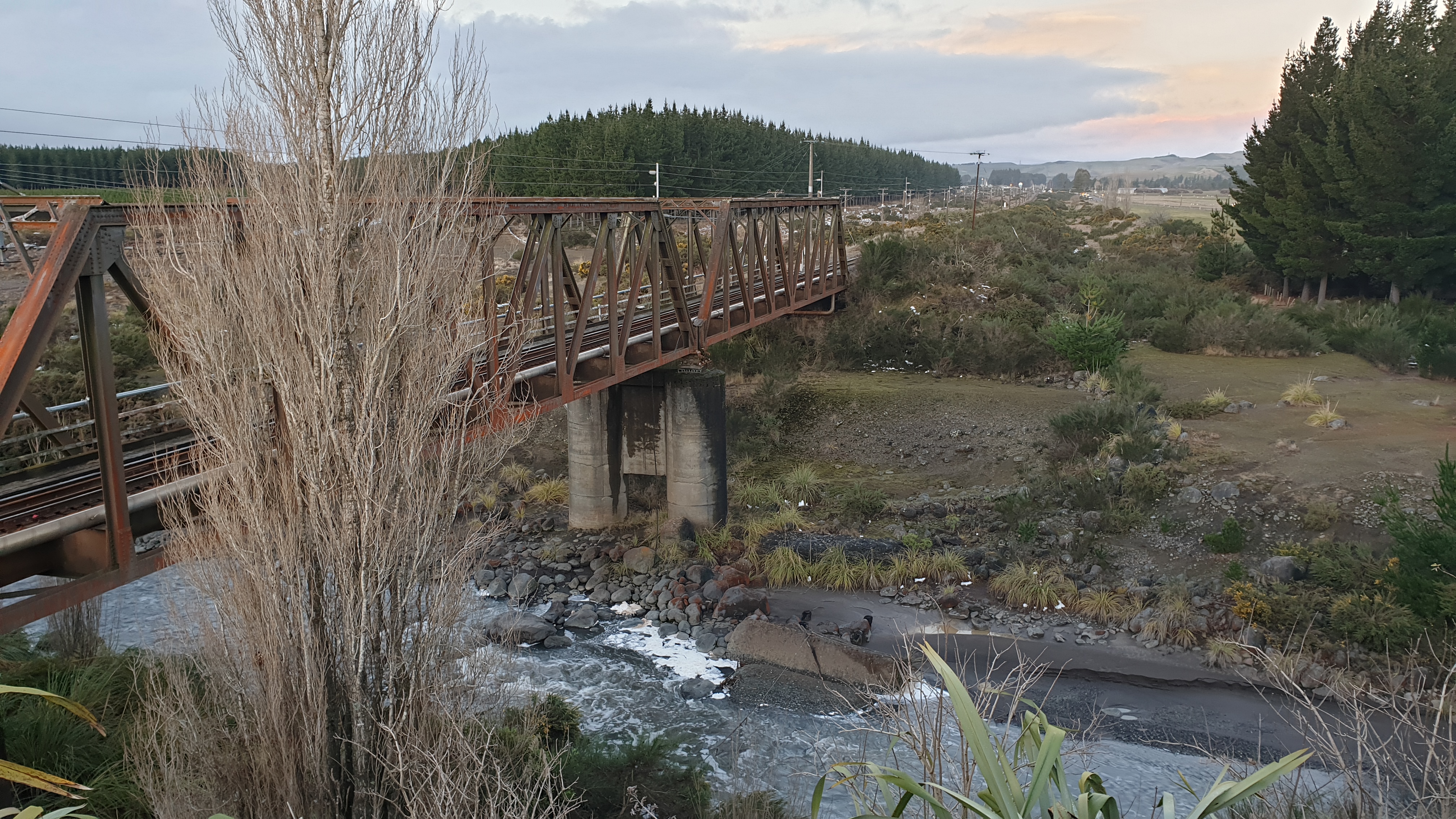 Tangiwai Rail Bridge on the North Island Main Trunk, facing the direction of Wellington.  Site of the Tangiwai railway disaster on Christmas Eve 1953.  A concrete pier belonging to the bridge destroyed in the disaster is visible under the current bridge.