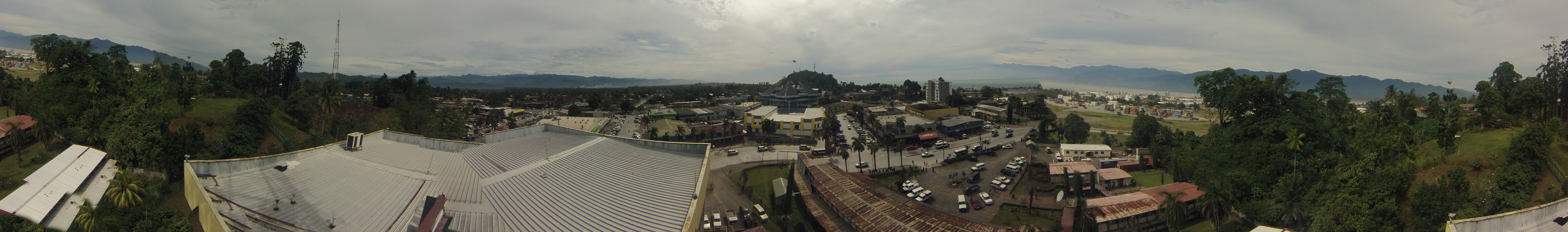 Panoramic photo of Lae city taken from top of the Telikom building, Lae. Governors residence to the left. Port to the right. Taken 29 January 2014