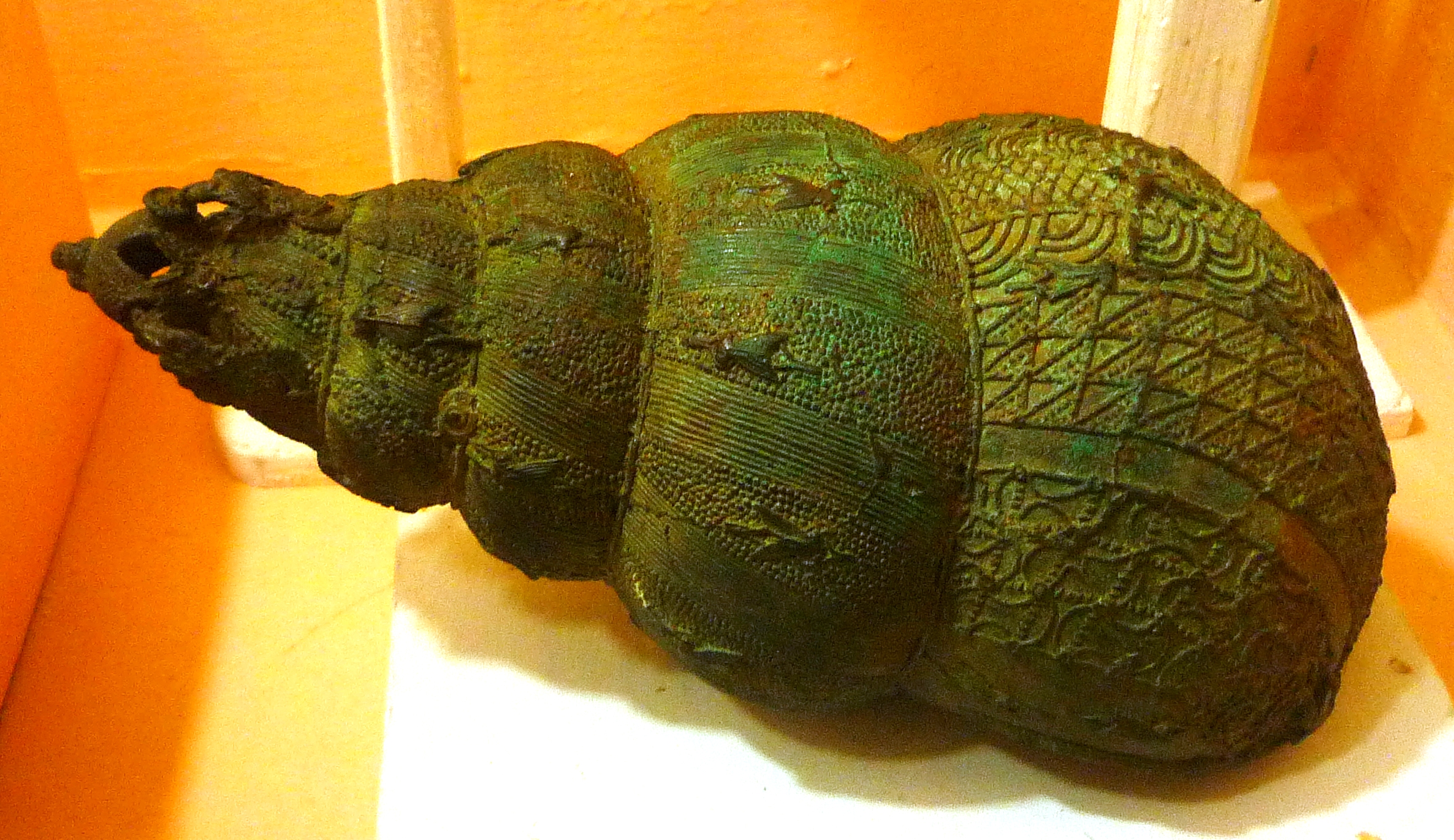 Photograph of a 9th century bronze vessel in the shape of a snail shell found at Igbo-Ukwu, Anambra State, Nigeria. Presently located in the National Museum, Onikan, Lagos, Nigeria