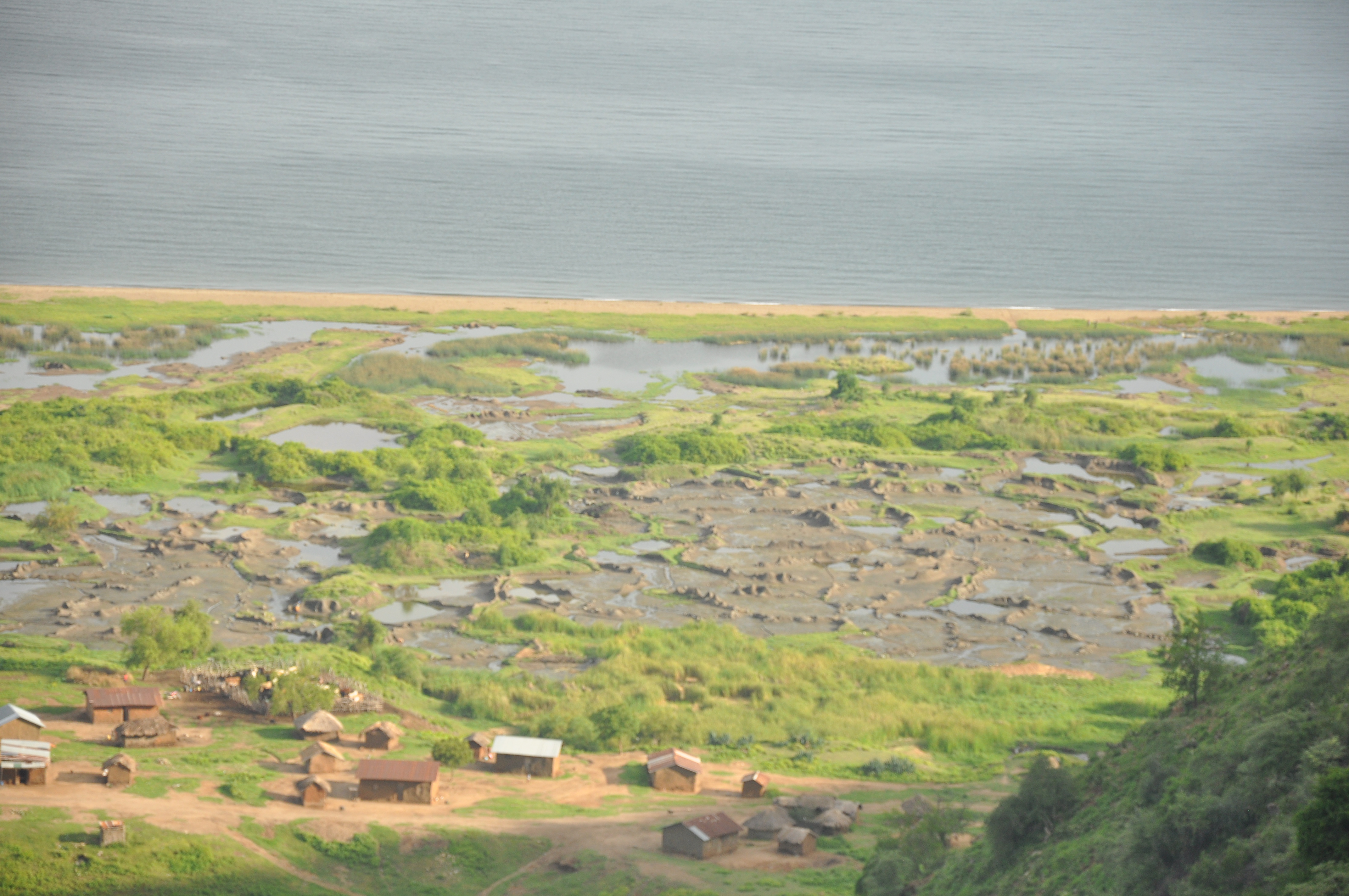 Kibiro Salt Gardens, located in Hoima district, Uganda, is a historical site that dates back centuries. It is known for its traditional salt extraction methods and is considered one of the oldest salt gardens in East Africa.
The history of Kibiro Salt Gardens can be traced back to the pre-colonial era when the indigenous people of the area, primarily the Alur and the Banyoro, discovered the natural salt springs in the region. These salt springs were formed due to volcanic activity in the area, resulting in the presence of saltwater in the underground aquifers.