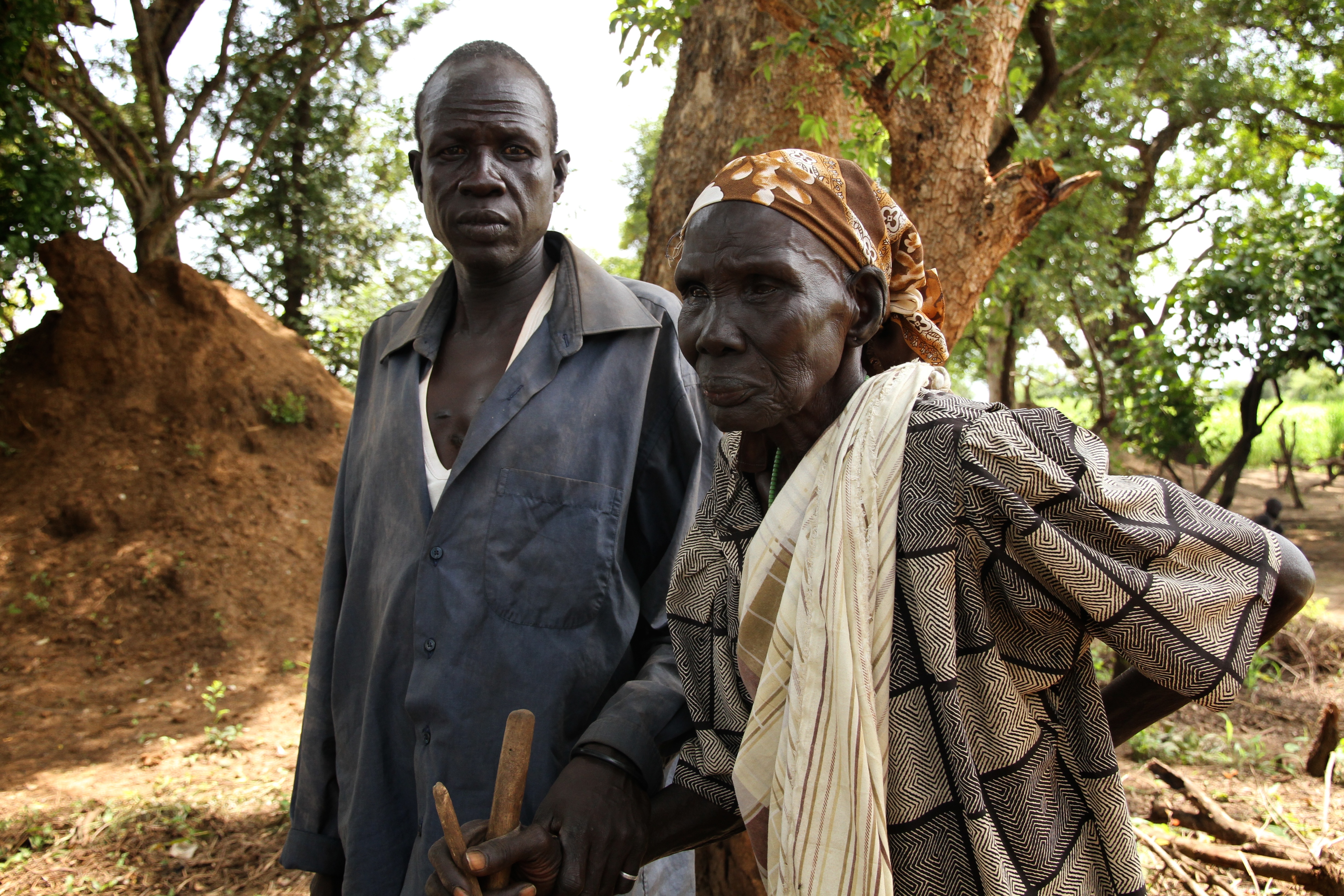 Wiyual is Nyakuer Rambang's only remaining son, as her other three sons were killed in conflict or trying to escape the fighting. 
'If the situation is calm in South Sudan I will return, but if not, I will stay here until the problem gets better. Even in the conflict before independence I was okay. This war has cost thousands of lives. Even the last war did not cause so many people to die. It is very difficult for me because I lost my sons.'

Photo: Oxfam/Aimee Brown