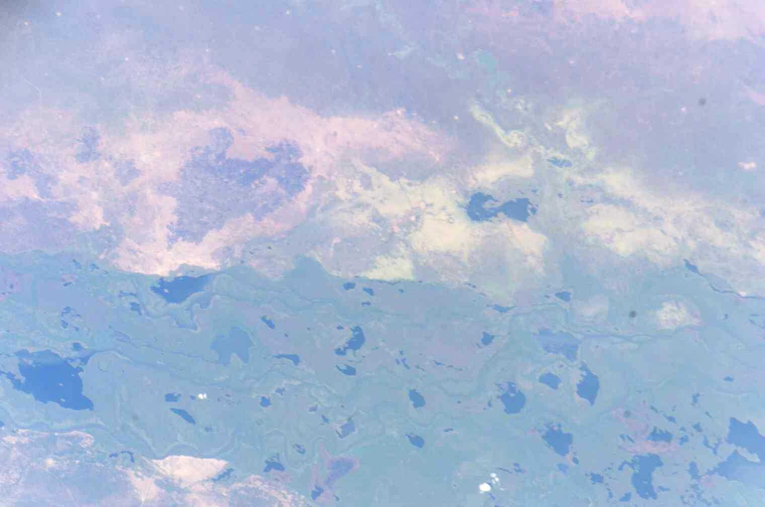 The White Nile and the city of Bor located off the east bank of the river — South Sudan. 

The photography is taken from East loking westward, Bor appears as a light triangle at the very bottom of the photography.
In Jonglei state, in the Greater Upper Nile region of northeastern South Sudan.