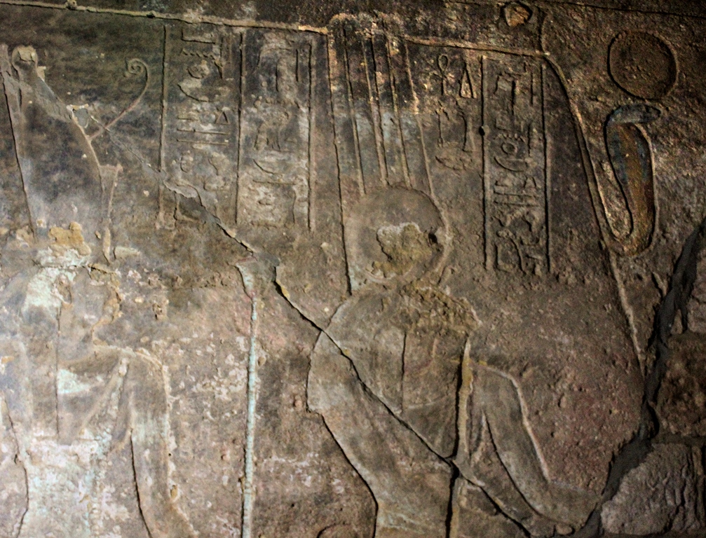 Jebel Barkal Temple of Mut: Amun accompanied by Mut pictured inside Jebel Barkal with the uraeus-pinnacle shown crowned with a sun disk hanging from the cliff