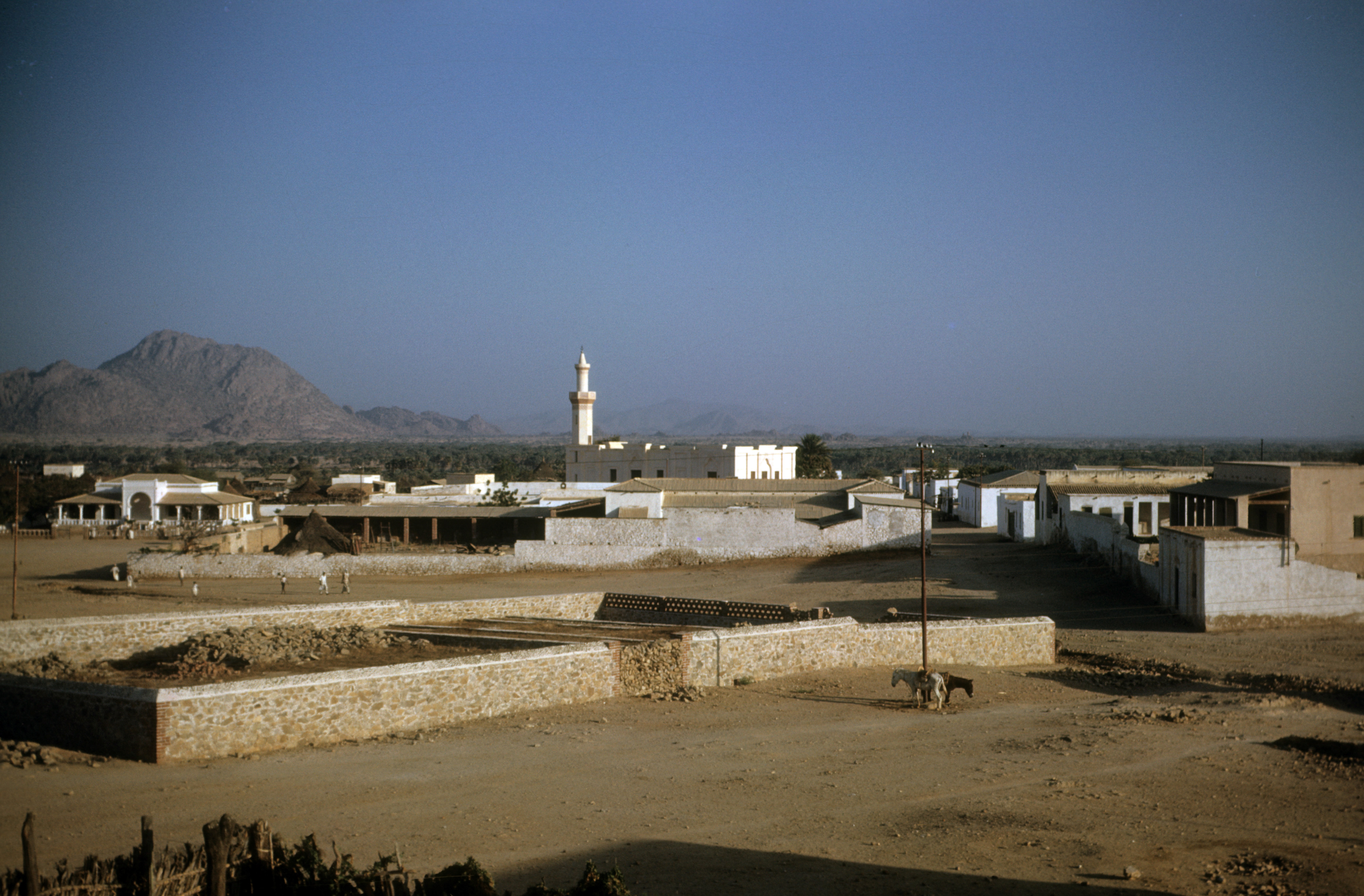 Pictures taken while stationed at U.S. Army Kagnew Station, Asmara, late 1940s. 

Probably polo field, looking across town to the mosque's tower.