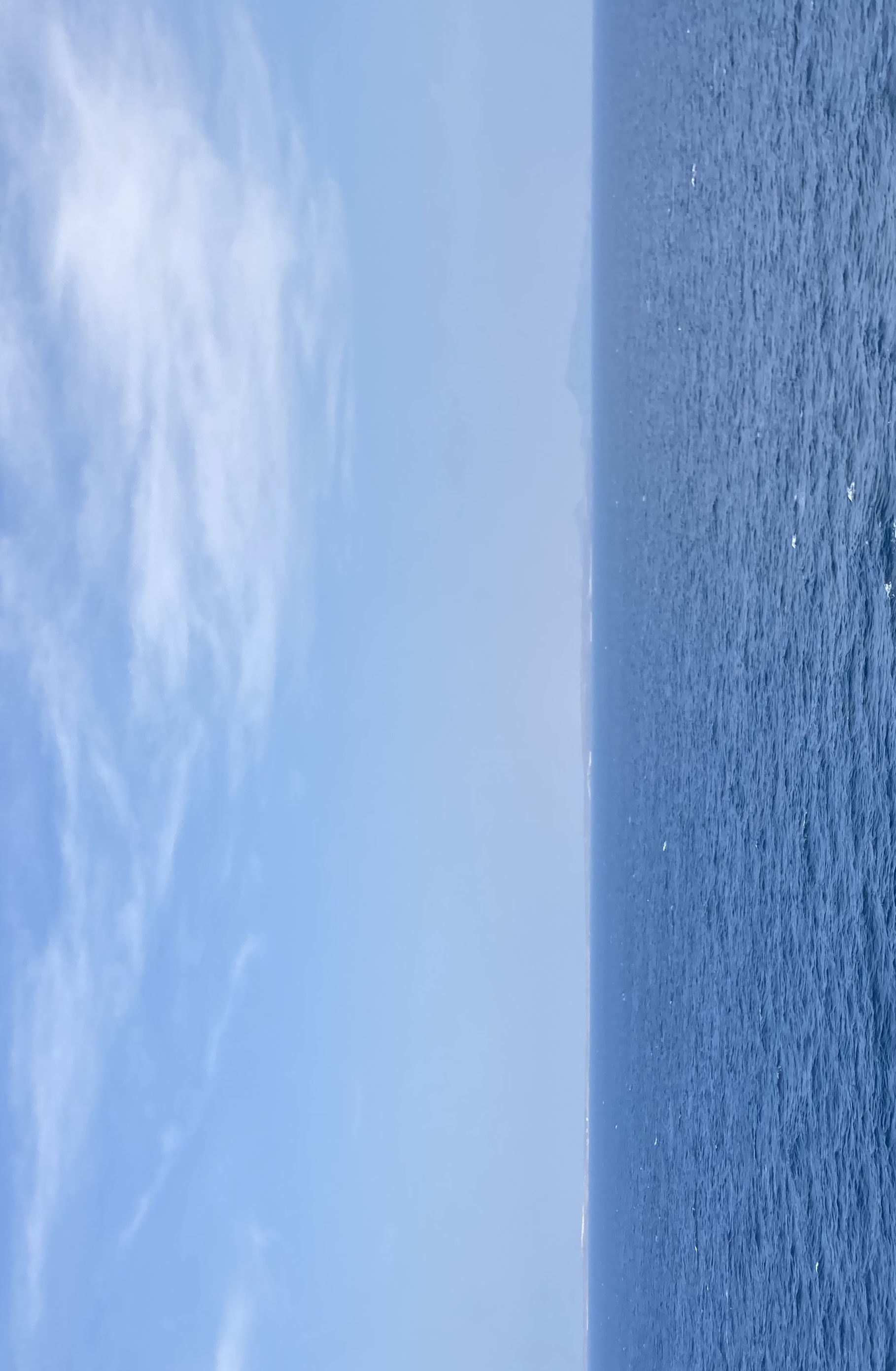 The Strait from Mid-Channel, December 2003.  Yemen is in the distance and looking the other way the Djibouti coast is just visible.