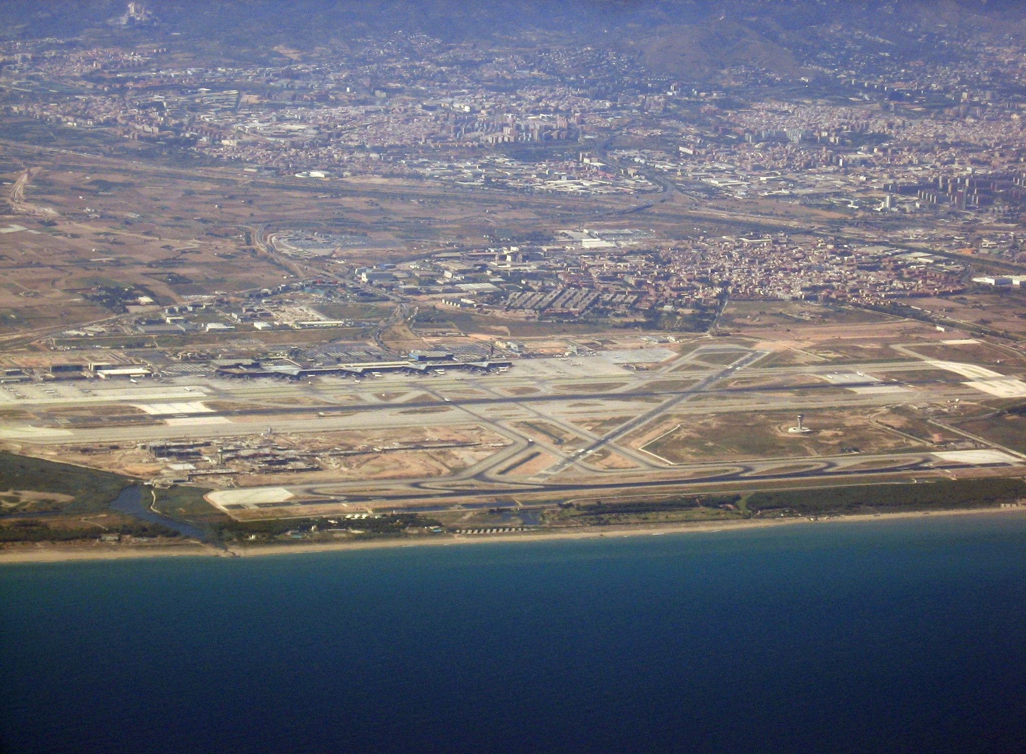 * Description: Barcelona International Airport seen from the sky
Source: self-made
Photographer: Thomas Möllmann
Date: July 21, 2006